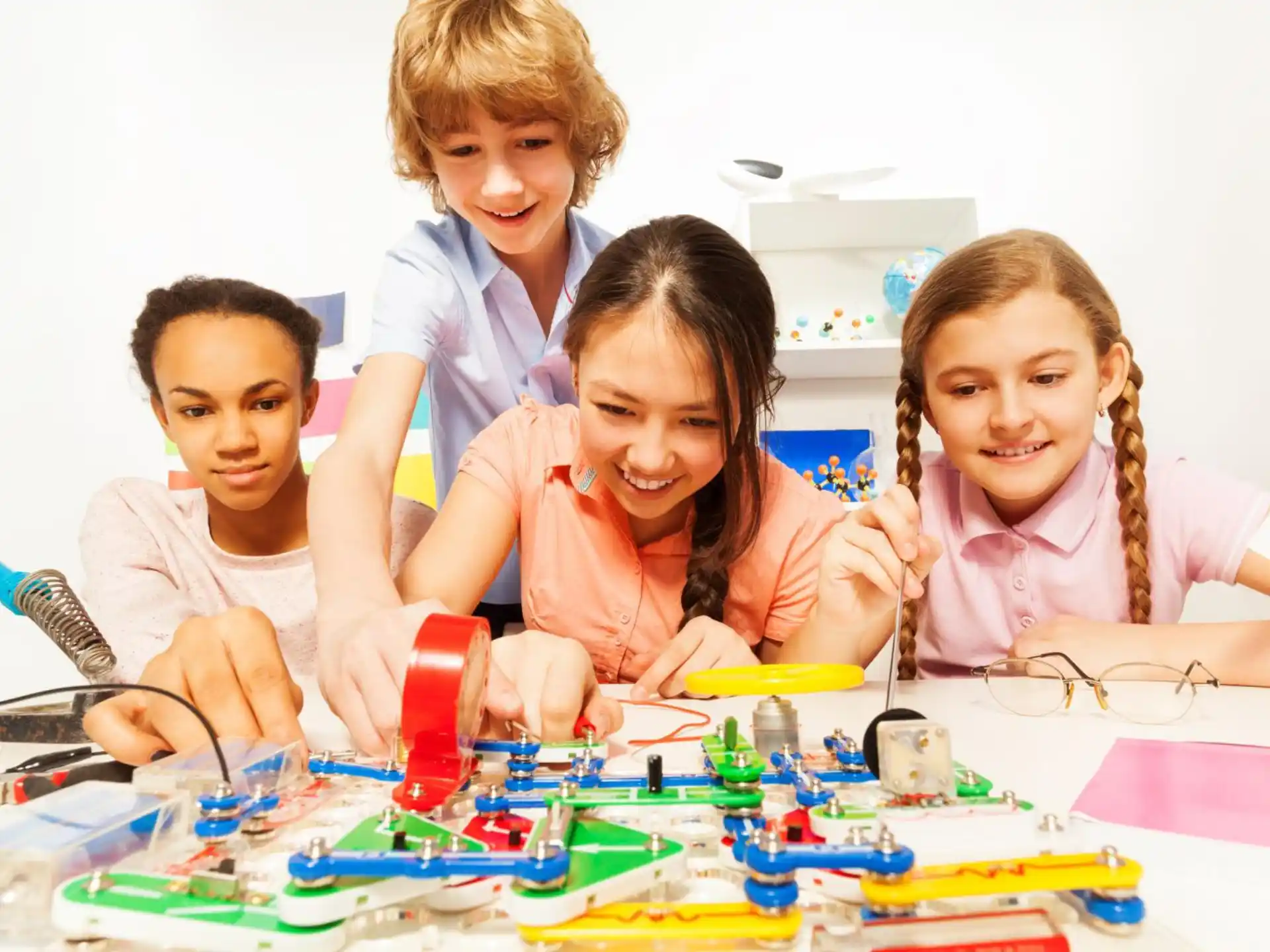 a group of children playing with toys