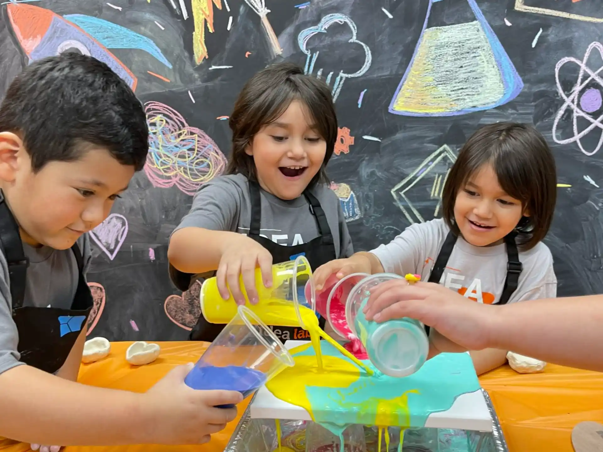 a group of children playing with toys