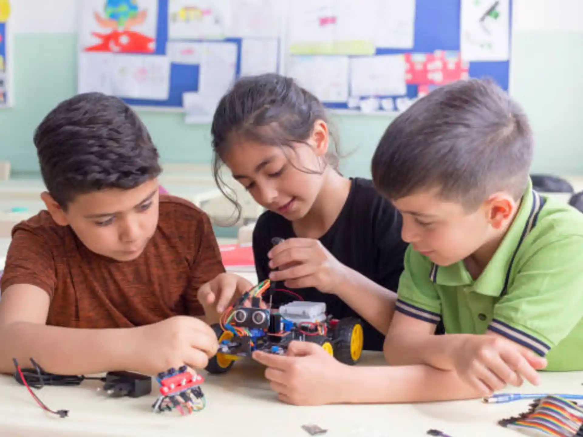 a group of children playing with a toy