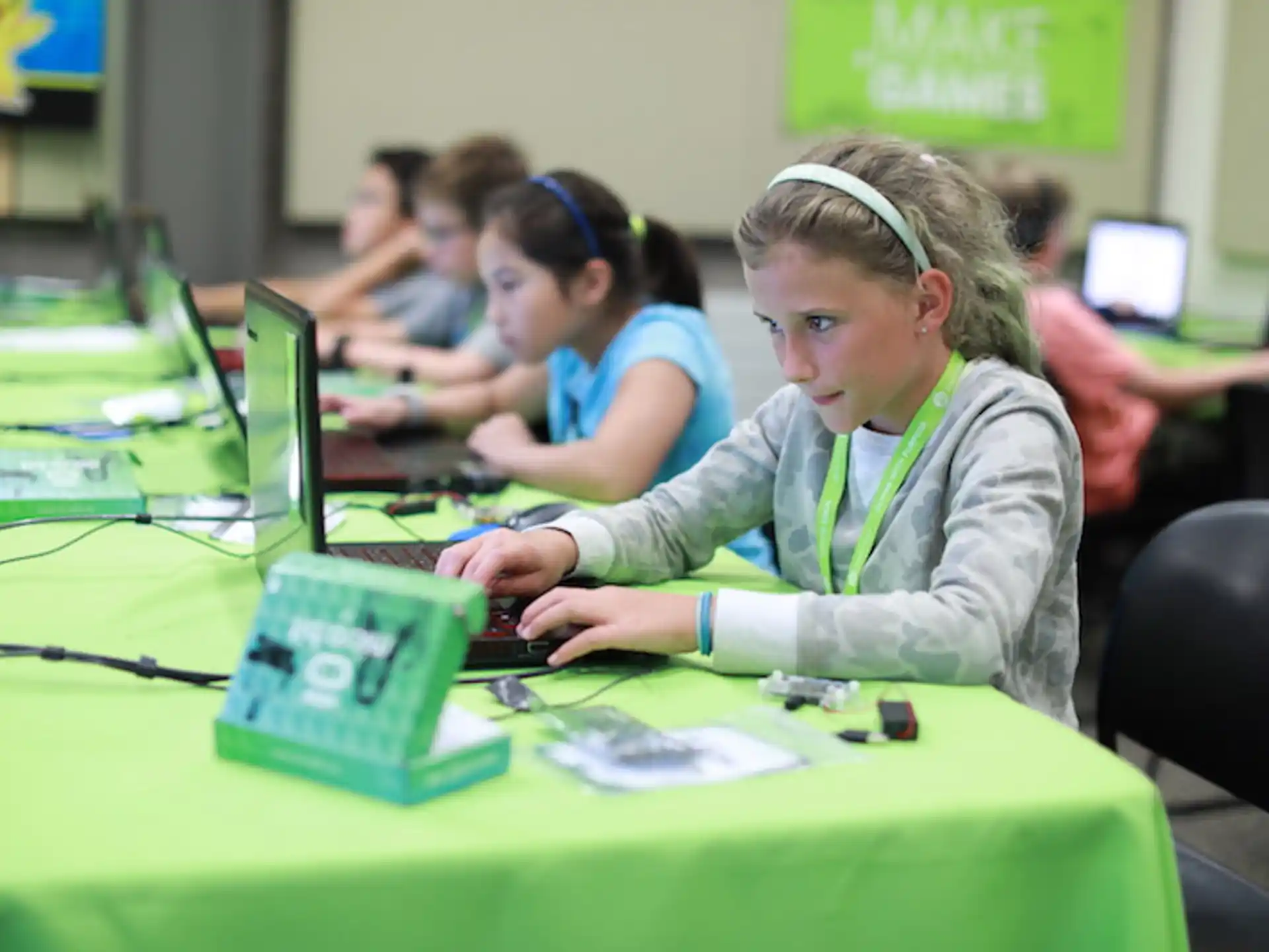 a group of people working on computers
