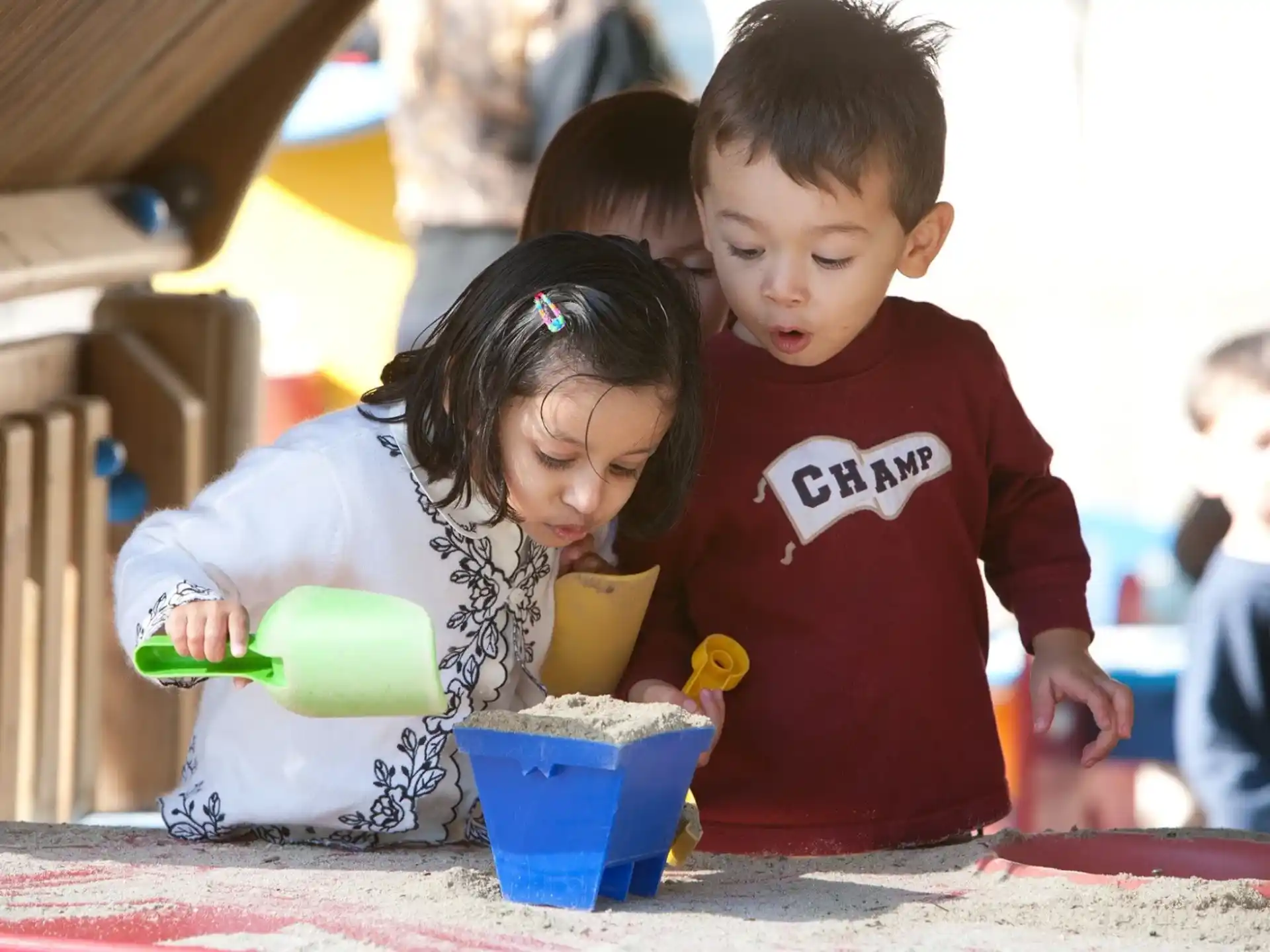 a few children playing with toys