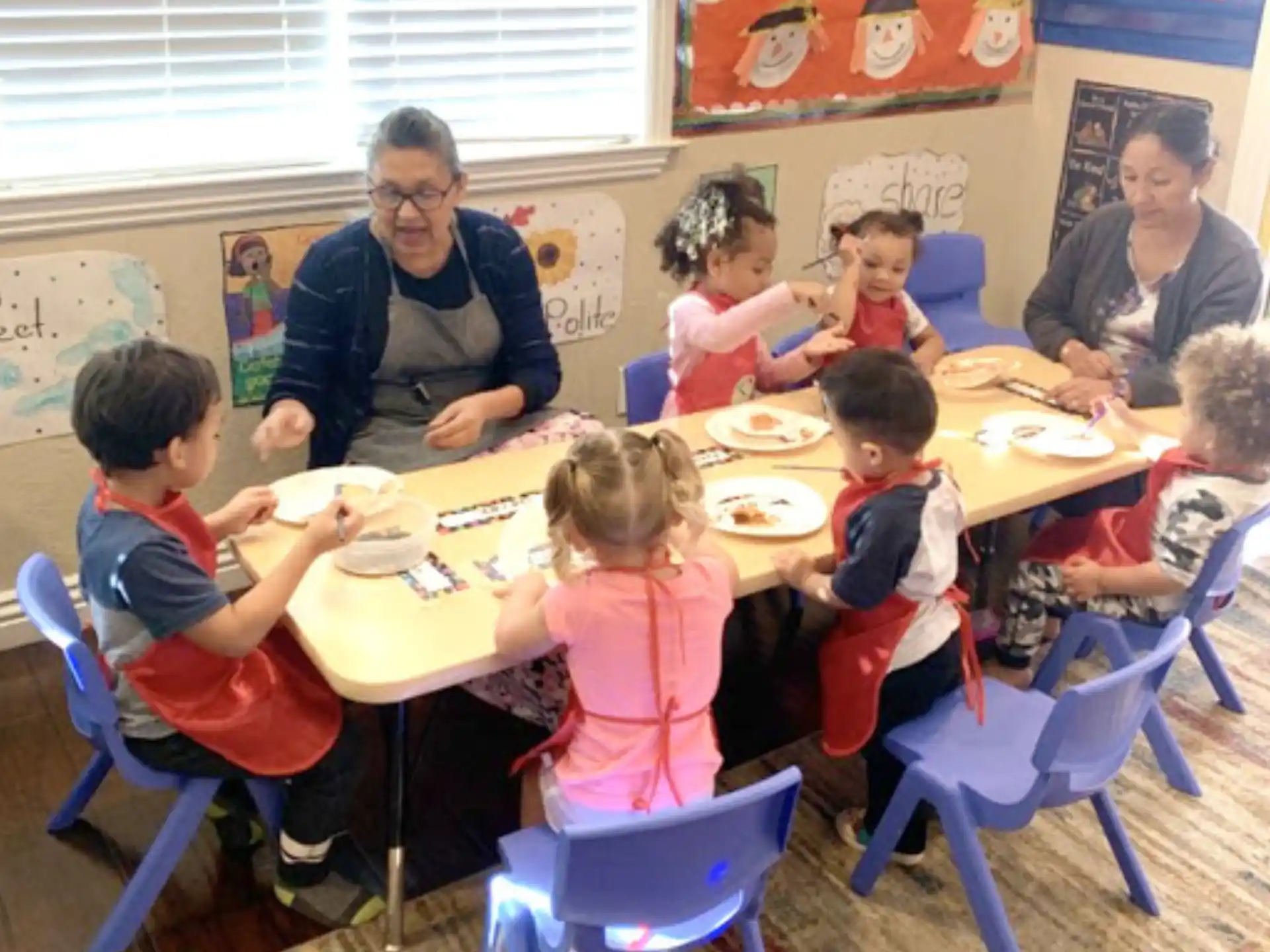 a group of people eating at a table