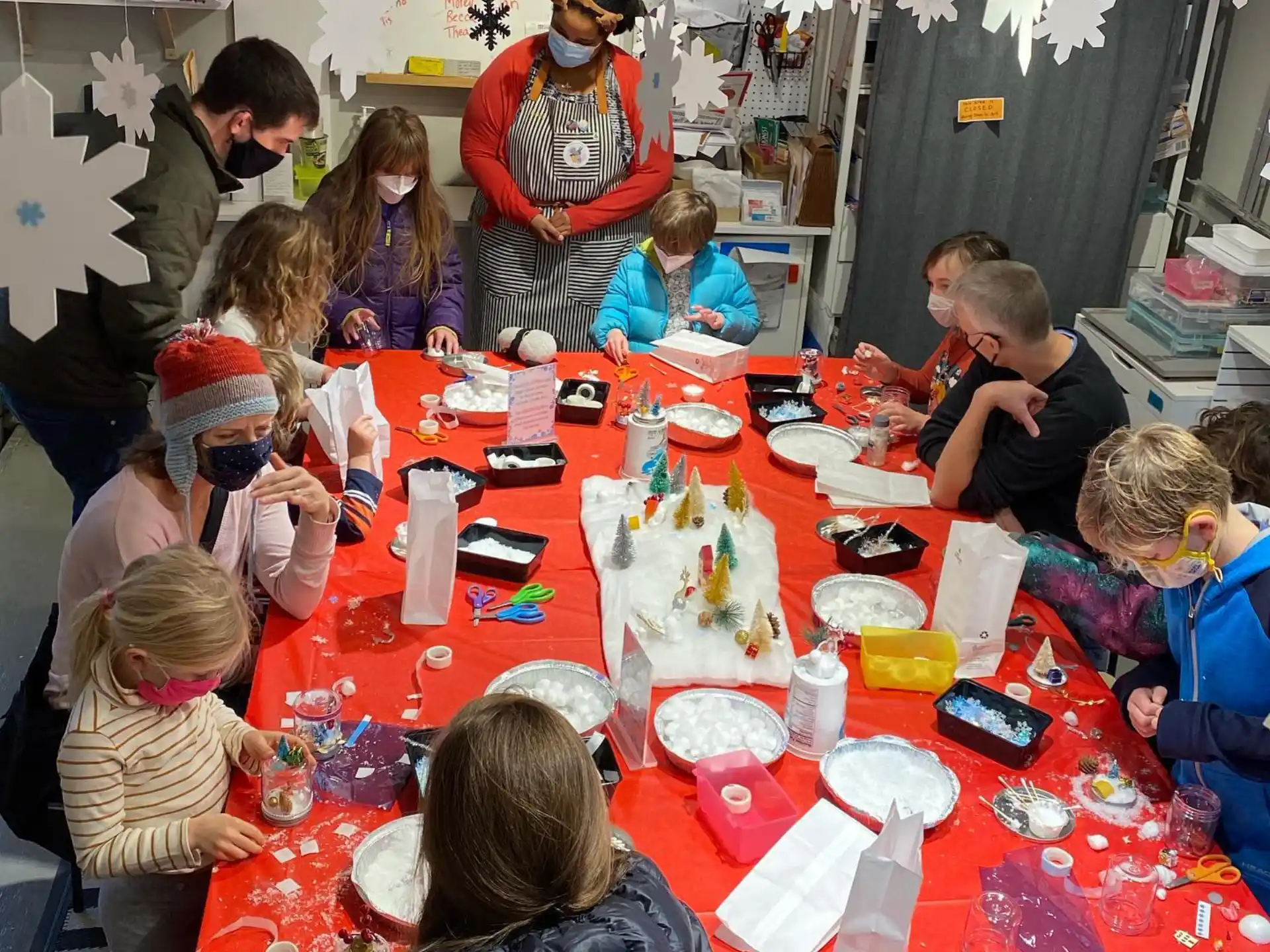 a group of people sitting around a table