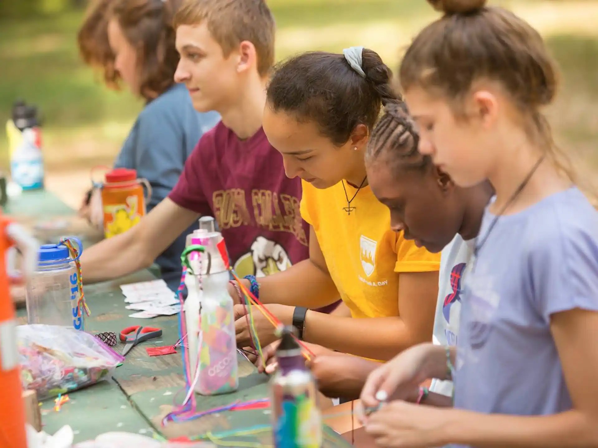 a group of kids painting