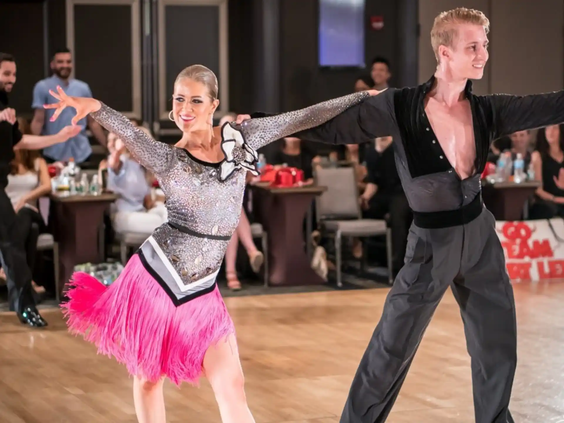 a man and woman dancing