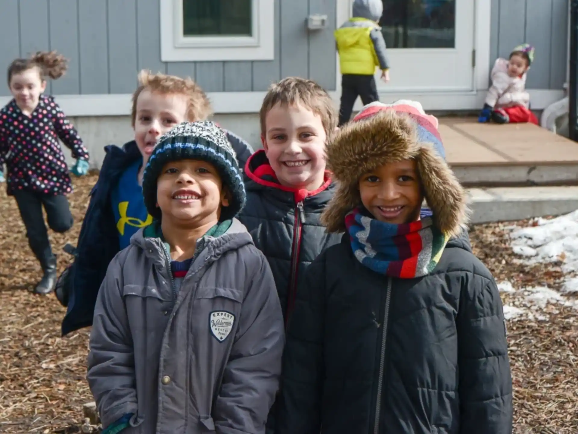 a group of children smiling