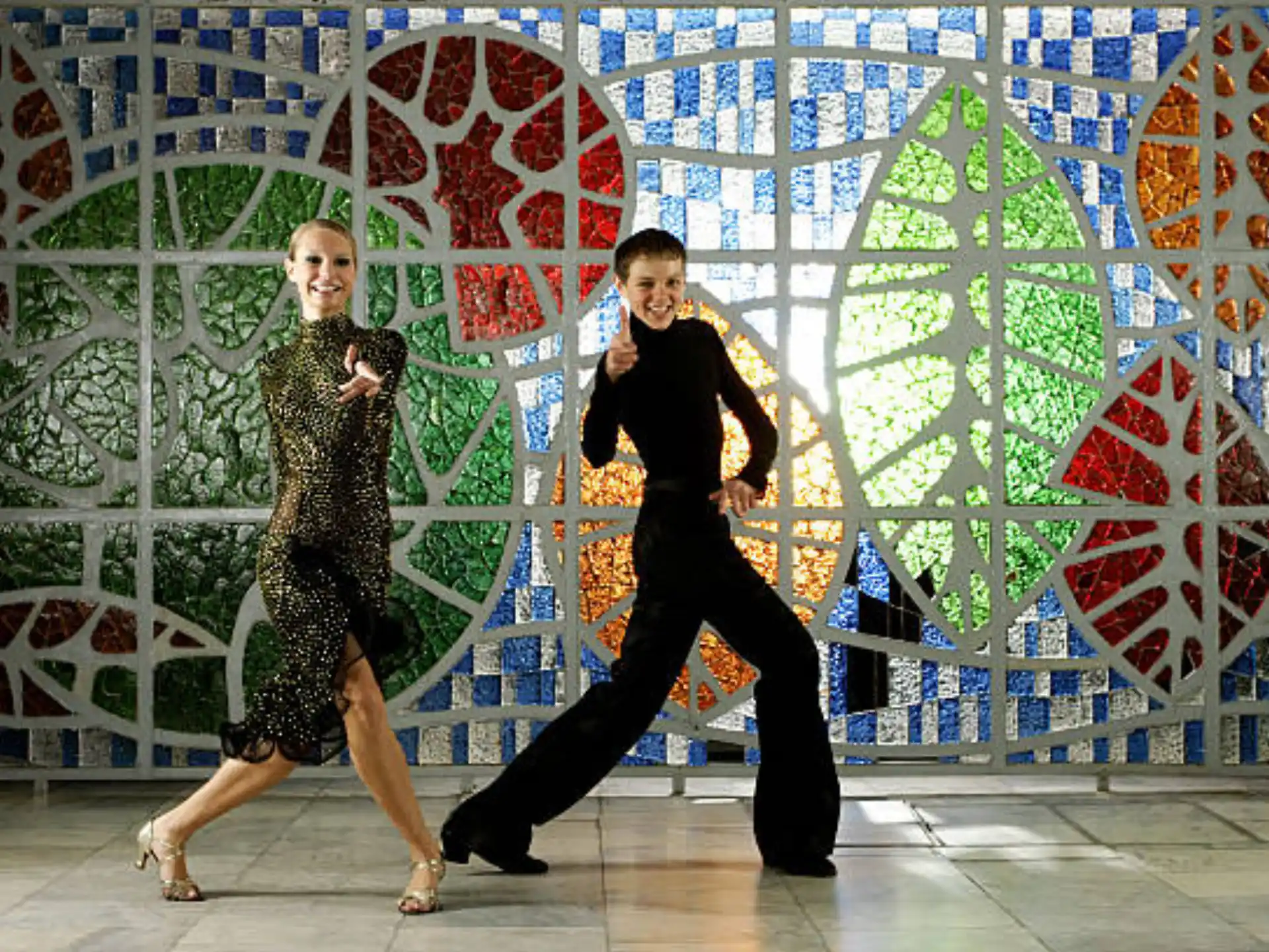 a man and woman dancing