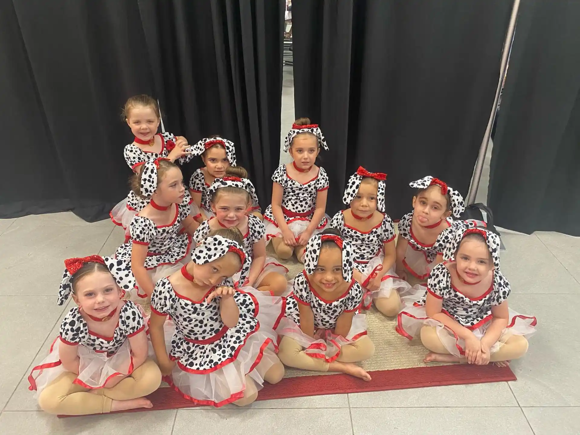 a group of children in traditional dress