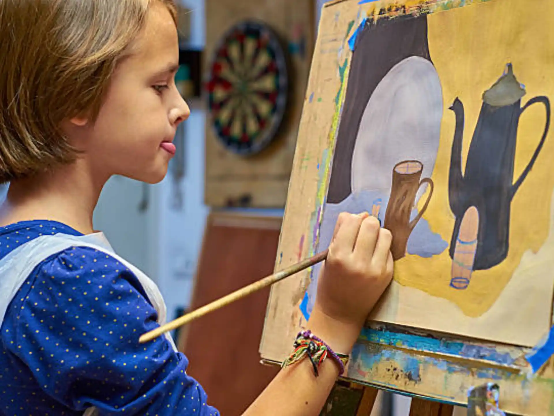 a young girl painting