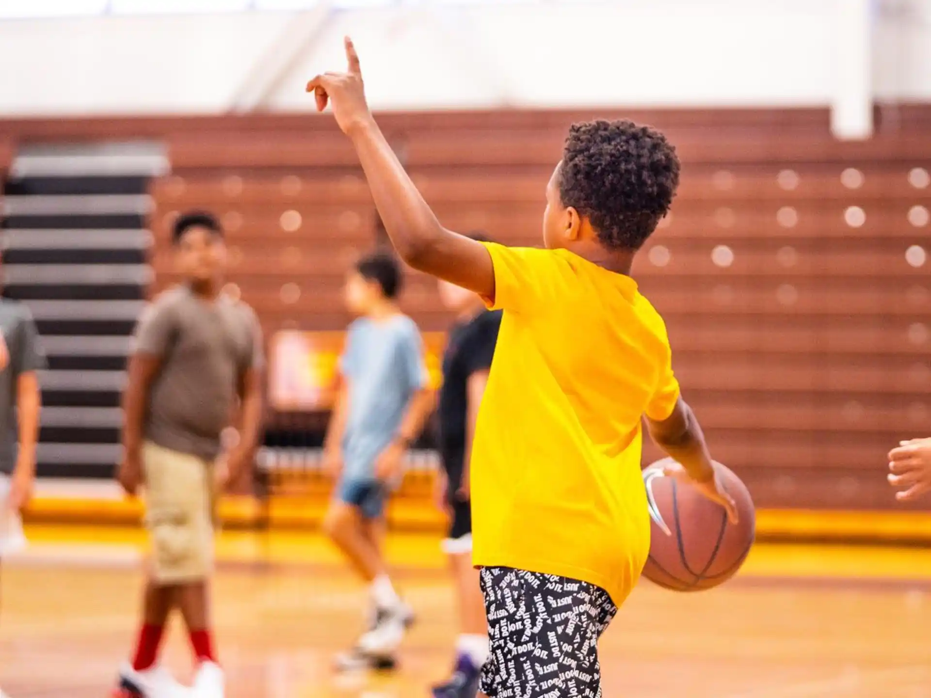 a boy playing basketball