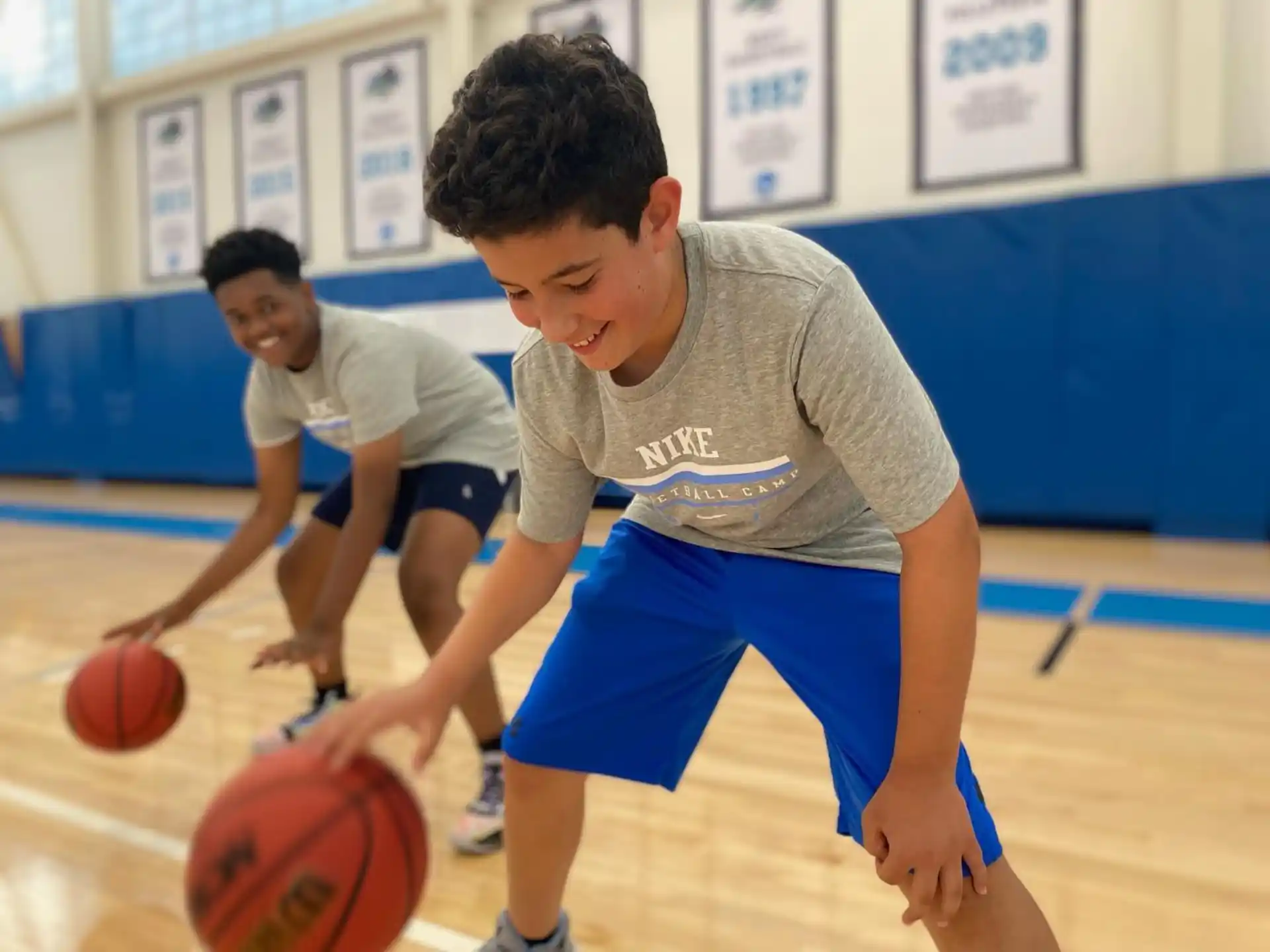 a few boys playing basketball