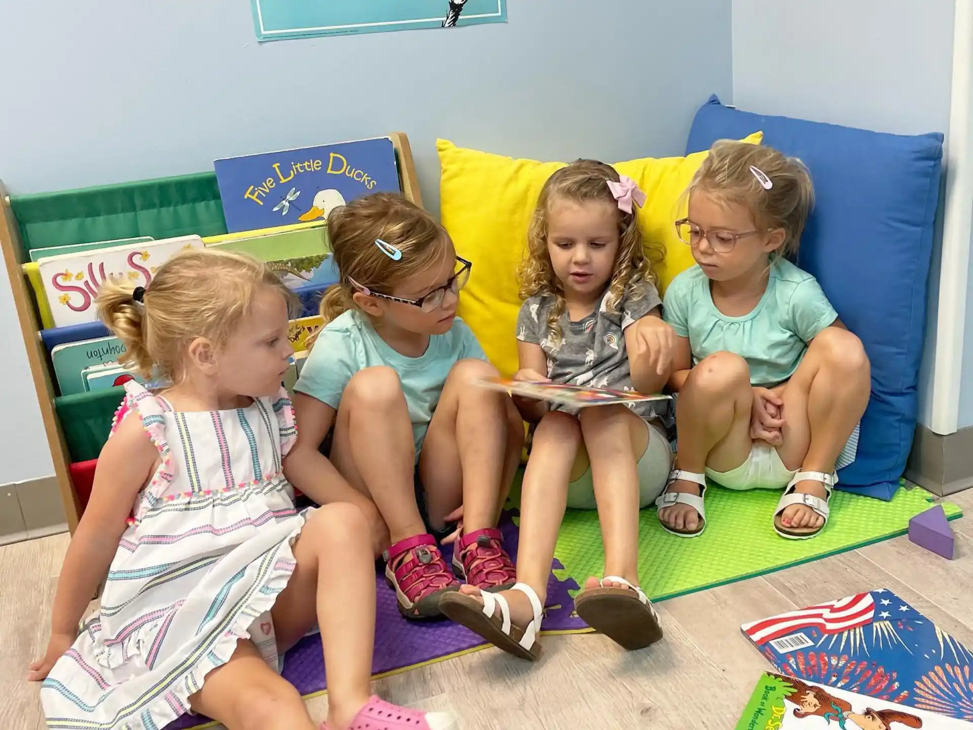 a group of children sitting on a couch
