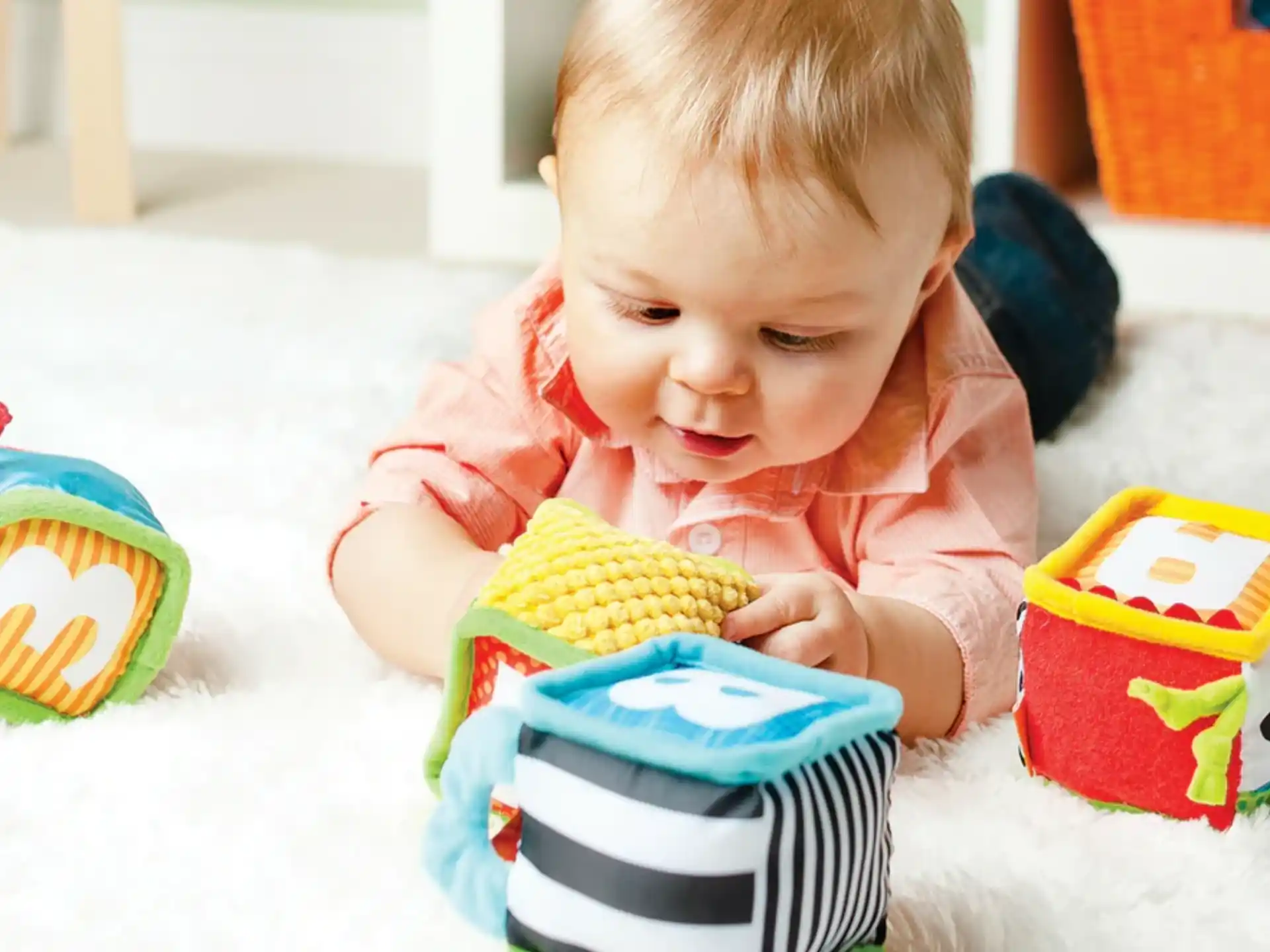 a baby playing with a toy