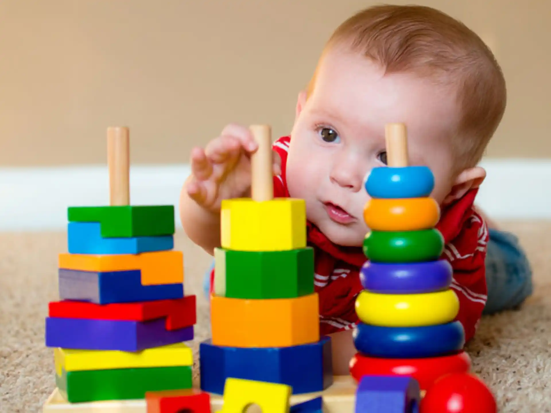 a baby playing with toys