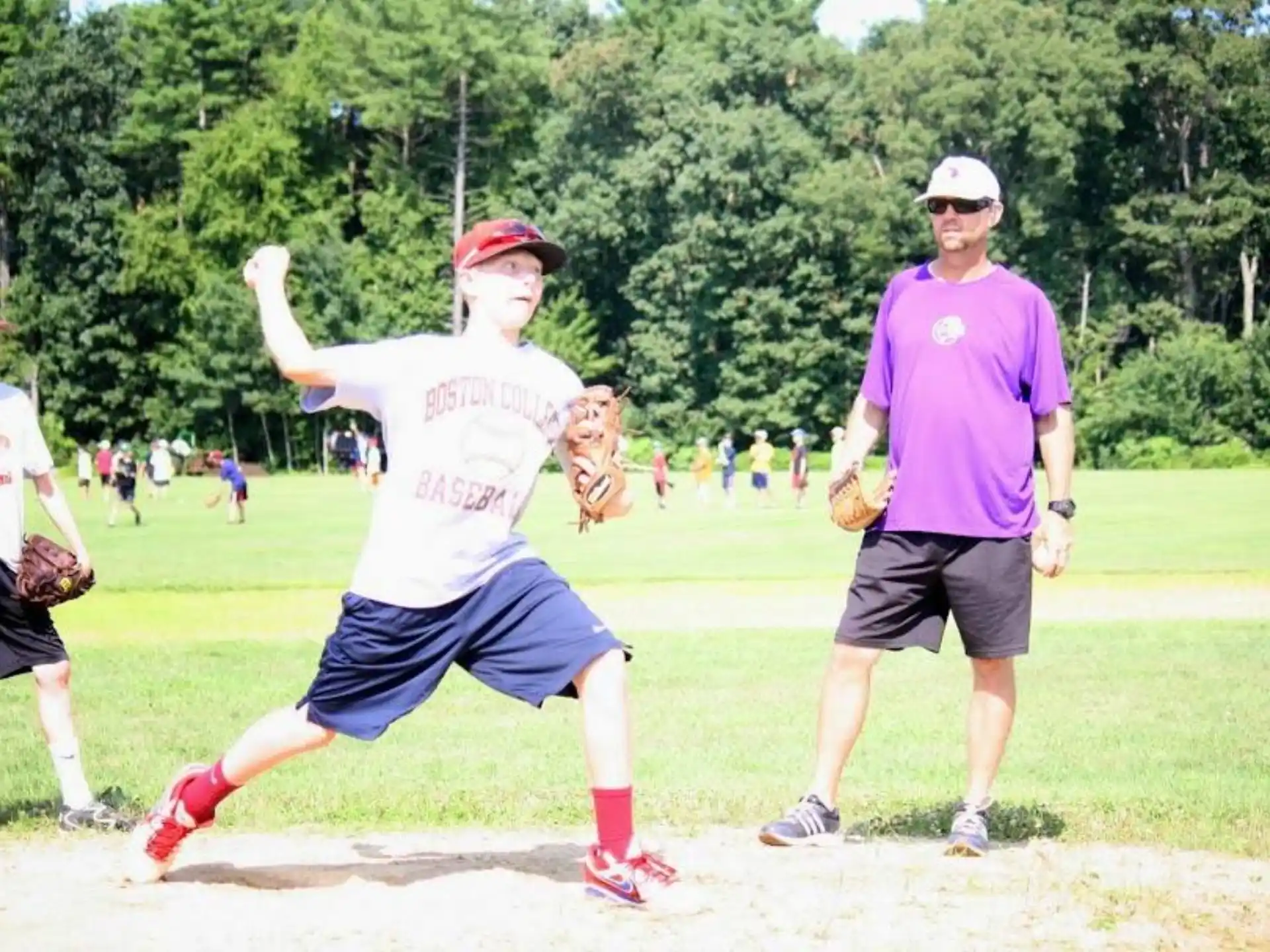 a man throwing a baseball