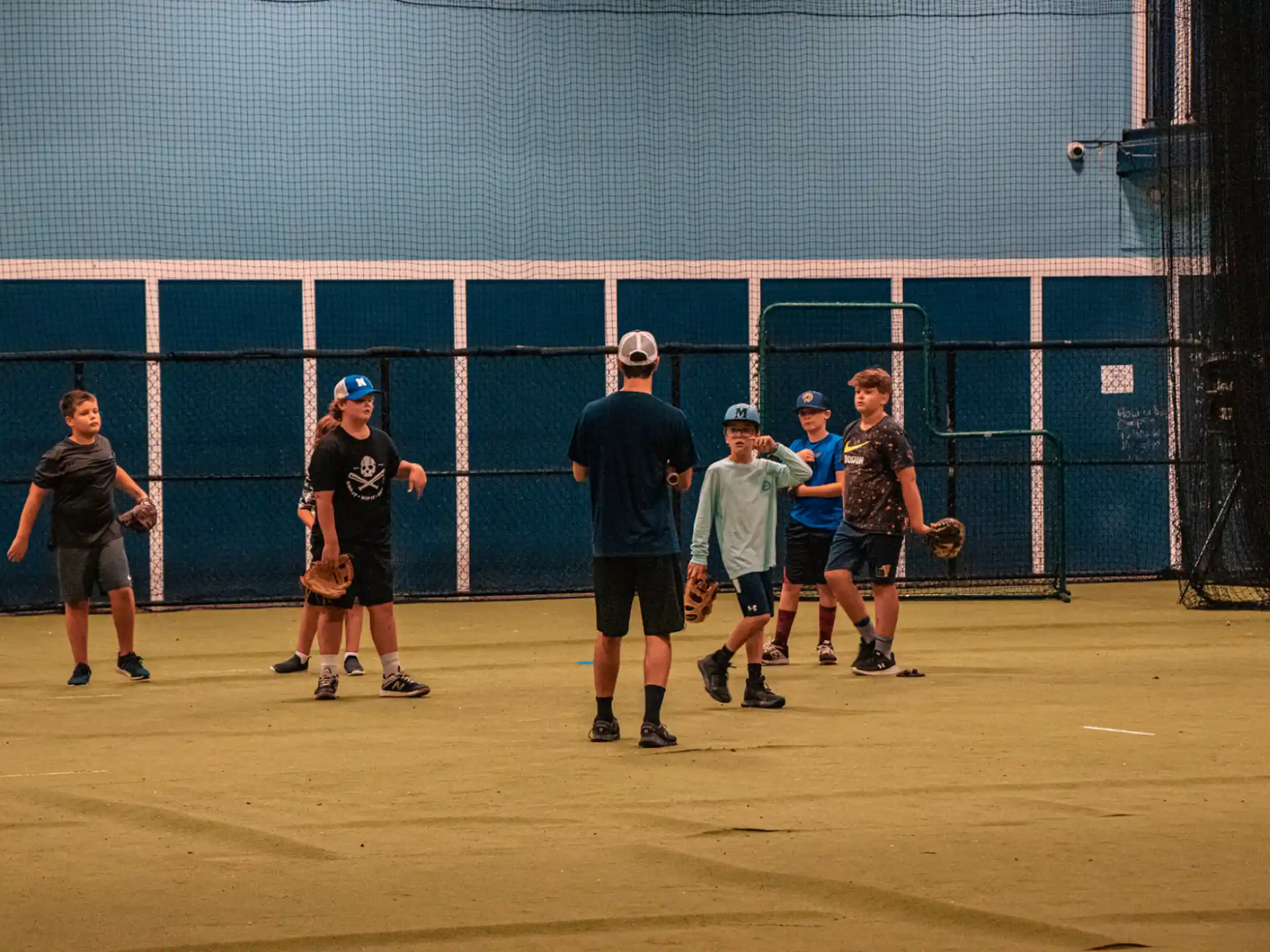 a group of people playing baseball