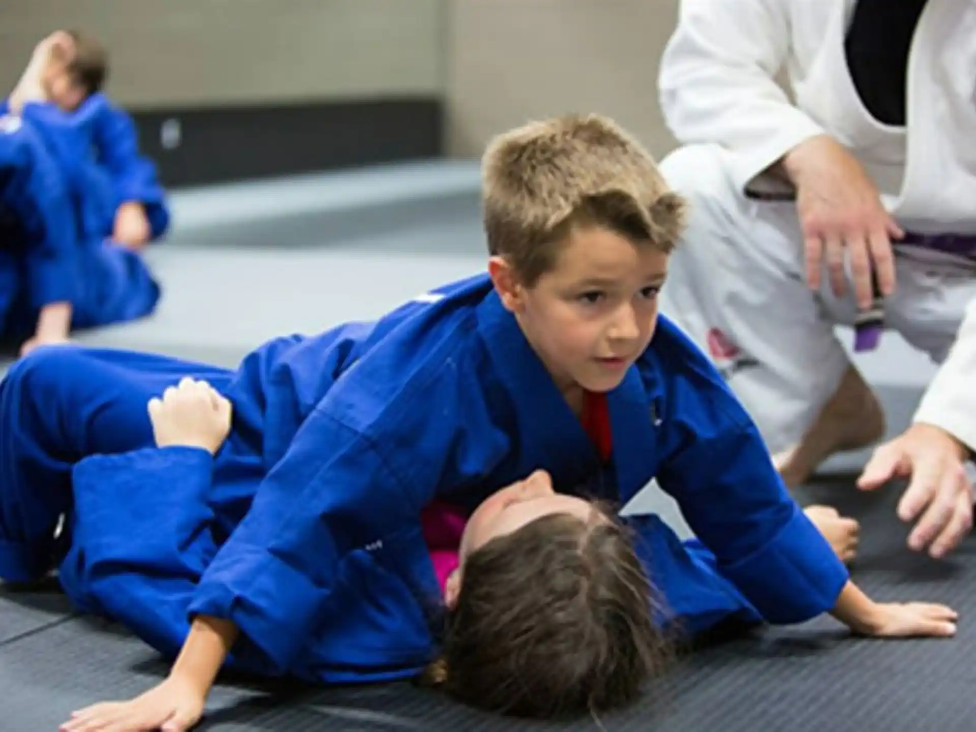 a boy lying on the floor