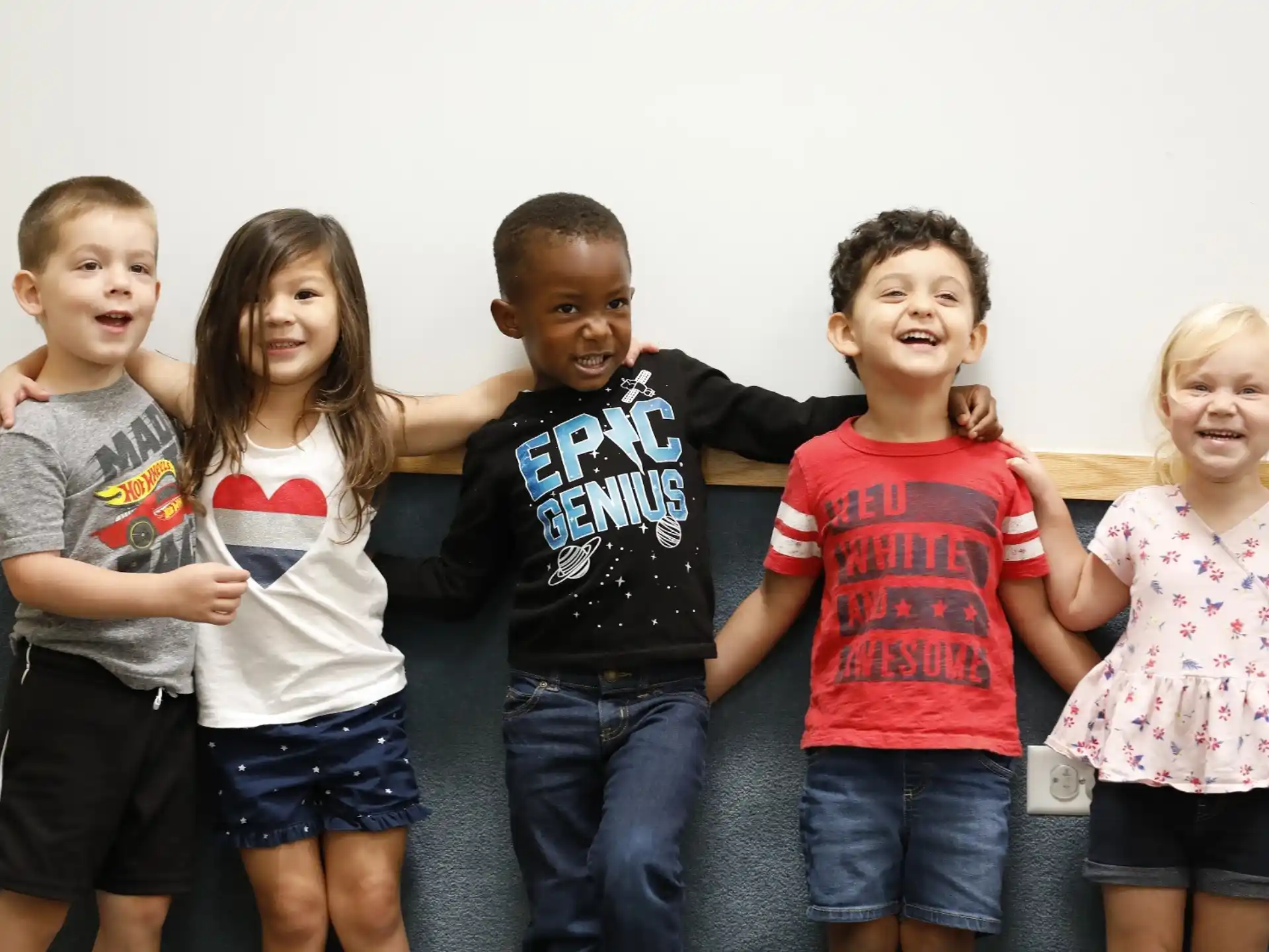 a group of children posing for a photo