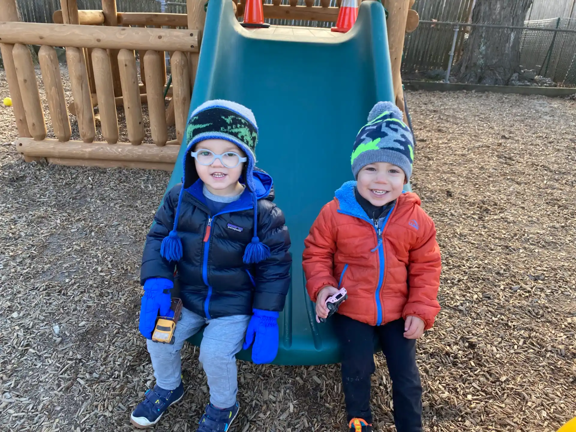 a couple of children posing for the camera