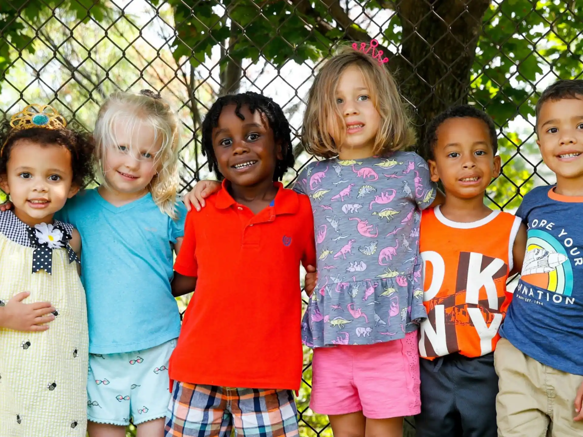 a group of children posing for a photo