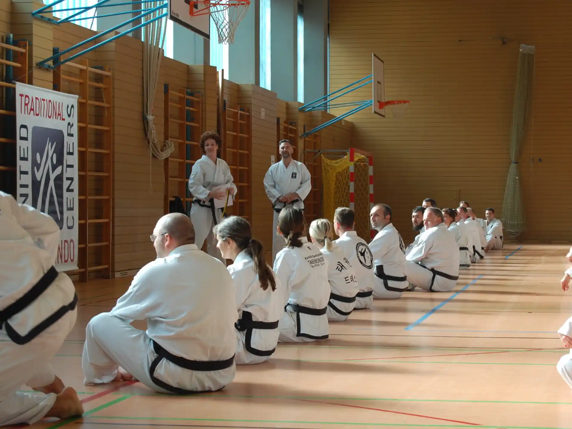 a group of people in white uniforms