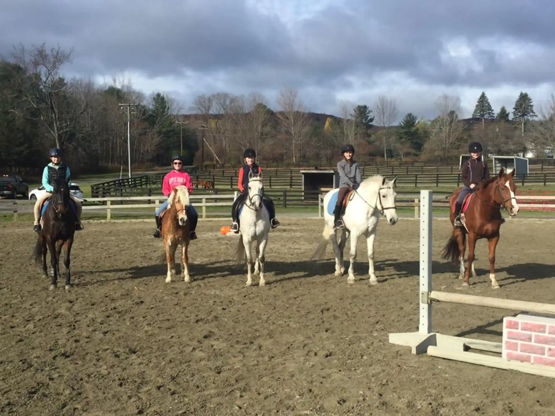 a group of people riding horses