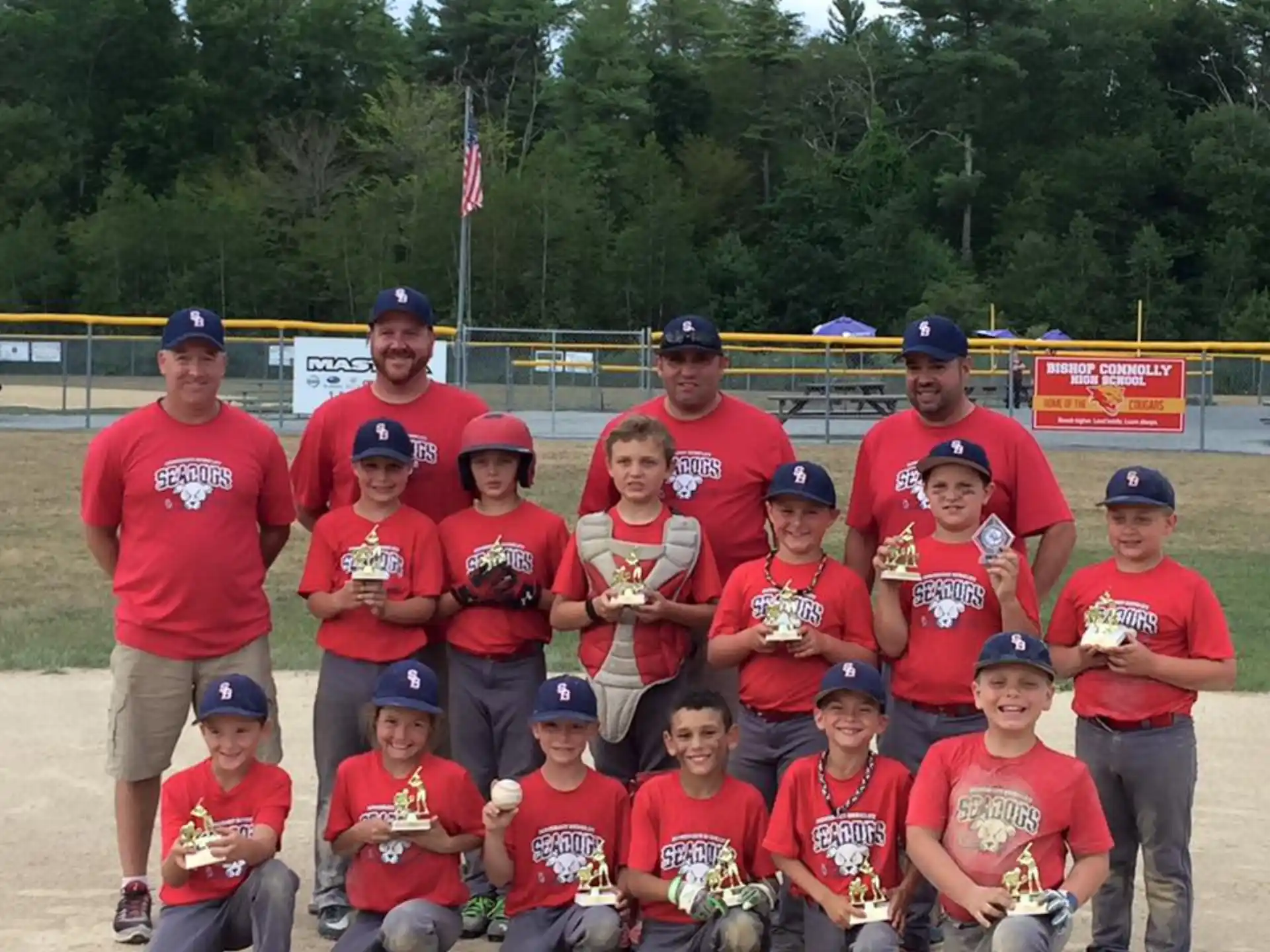 a group of baseball players posing for a photo