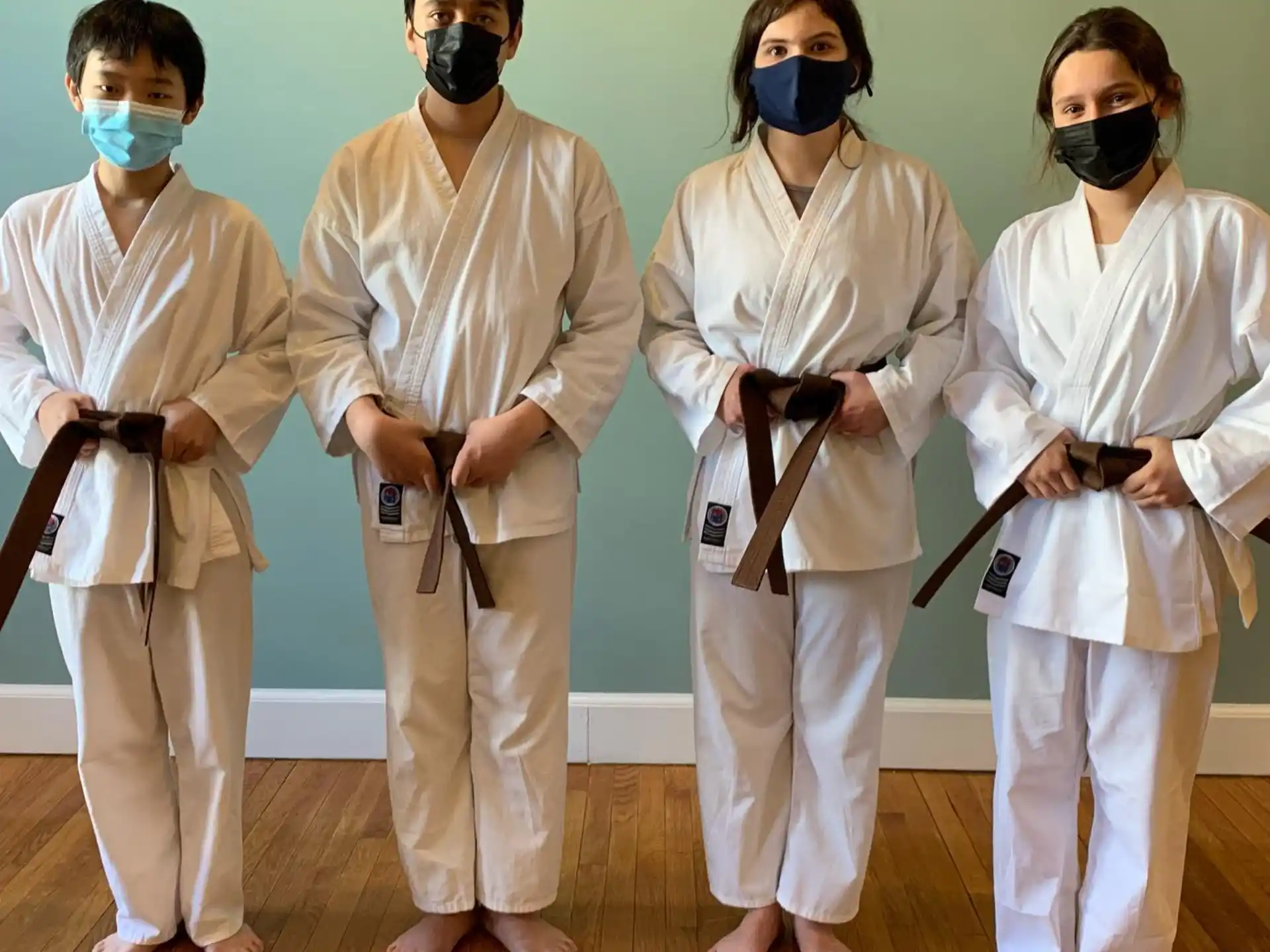 a group of people wearing masks