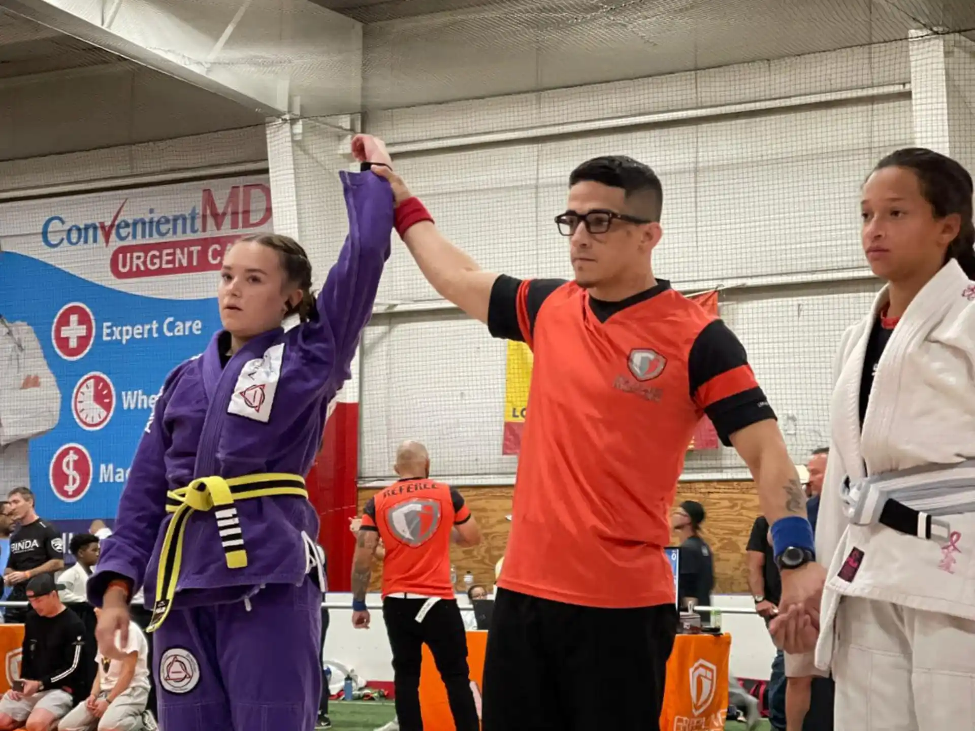 a man and a woman in a karate uniform