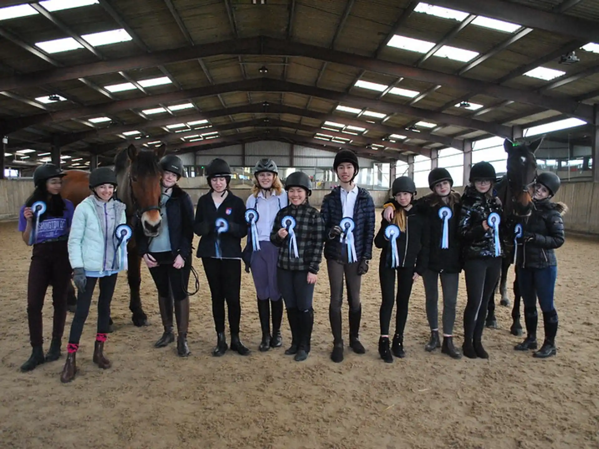 a group of people posing for a photo