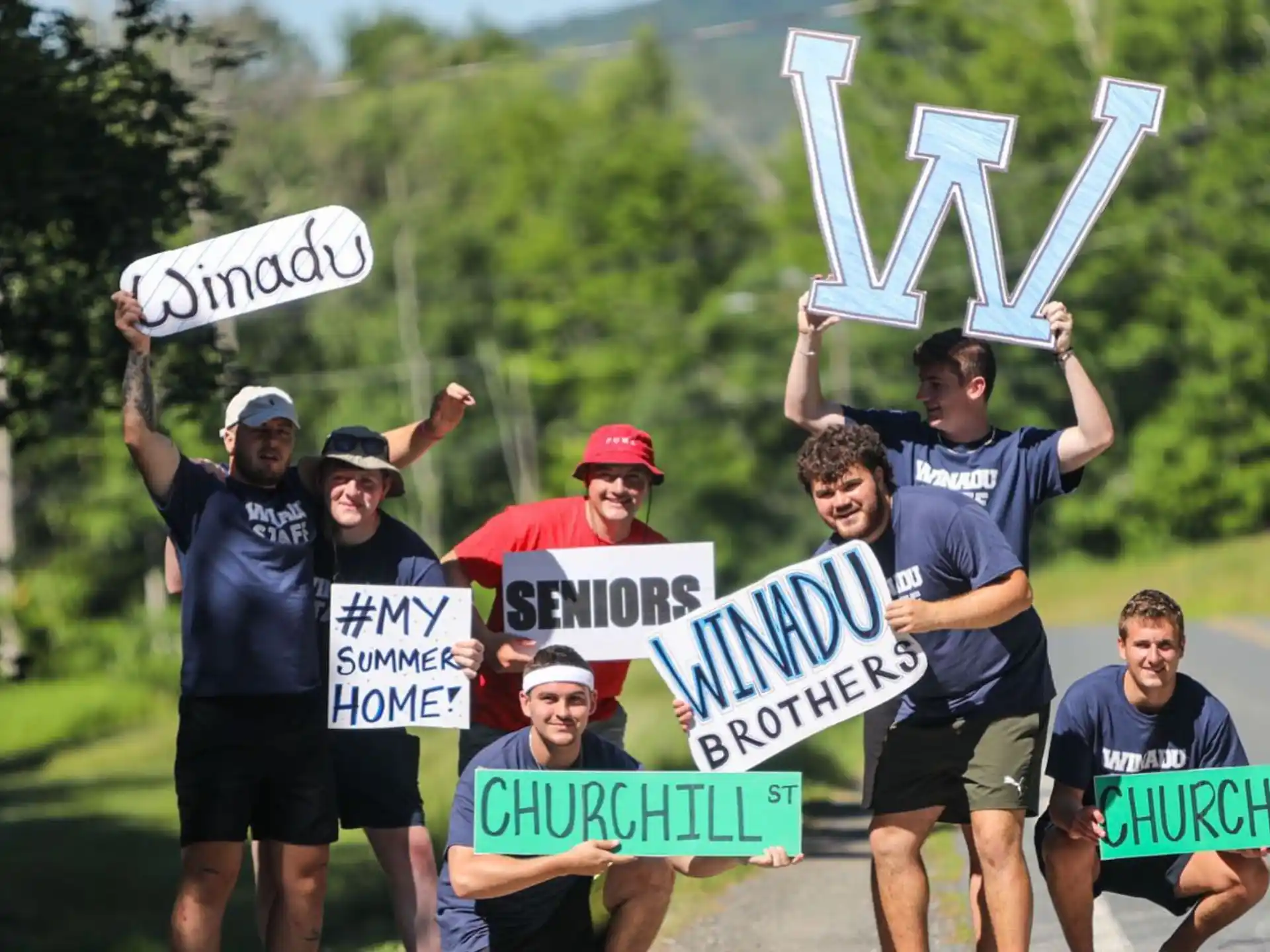 a group of people holding signs
