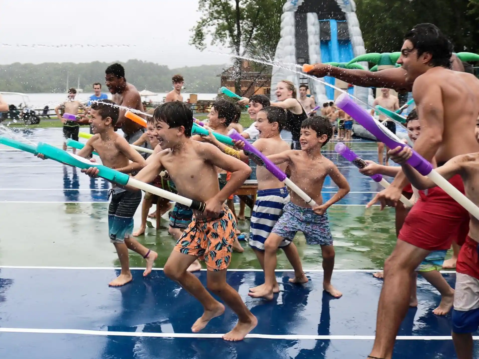 a group of people playing in a pool