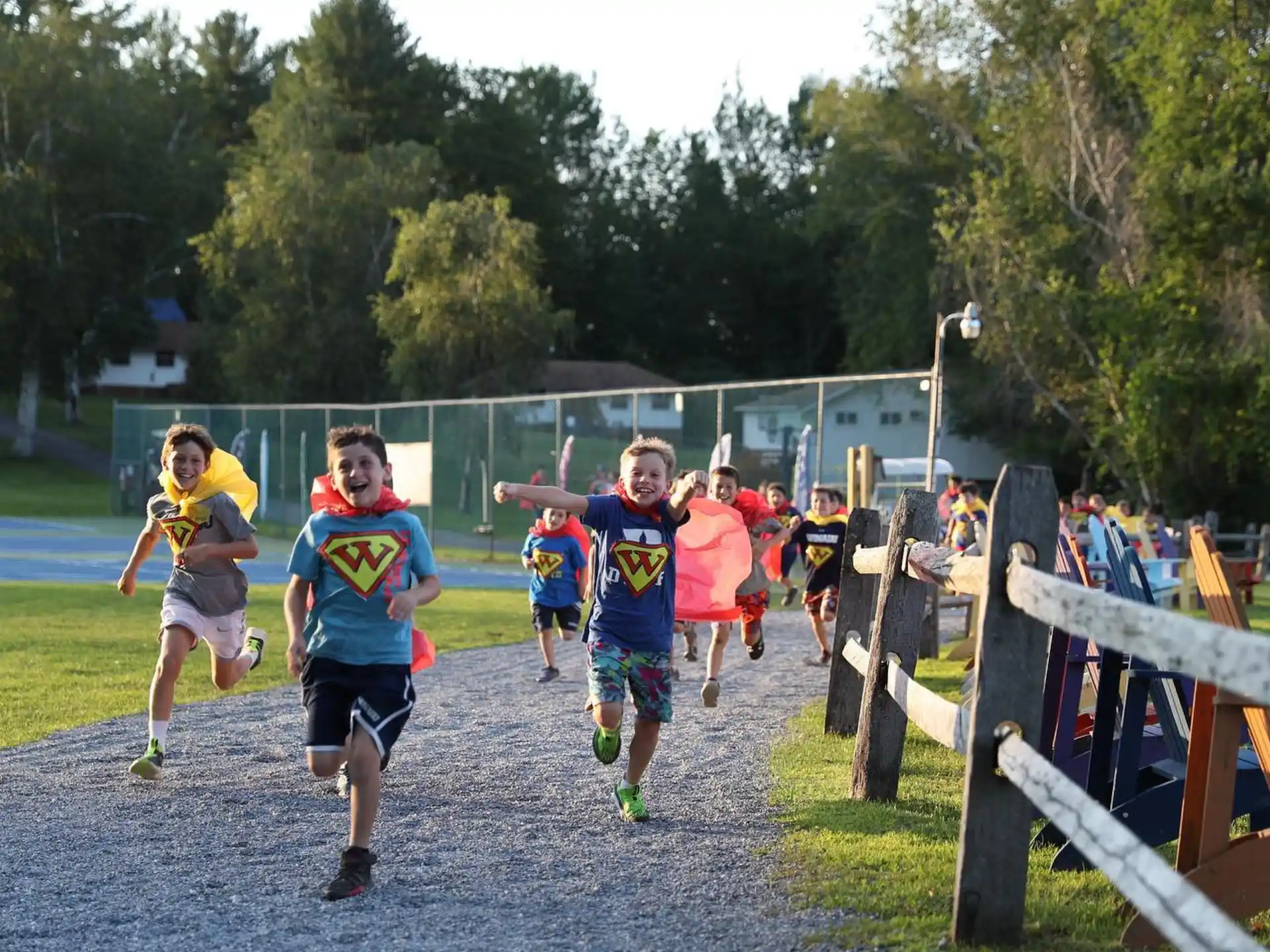 a group of people running on a track