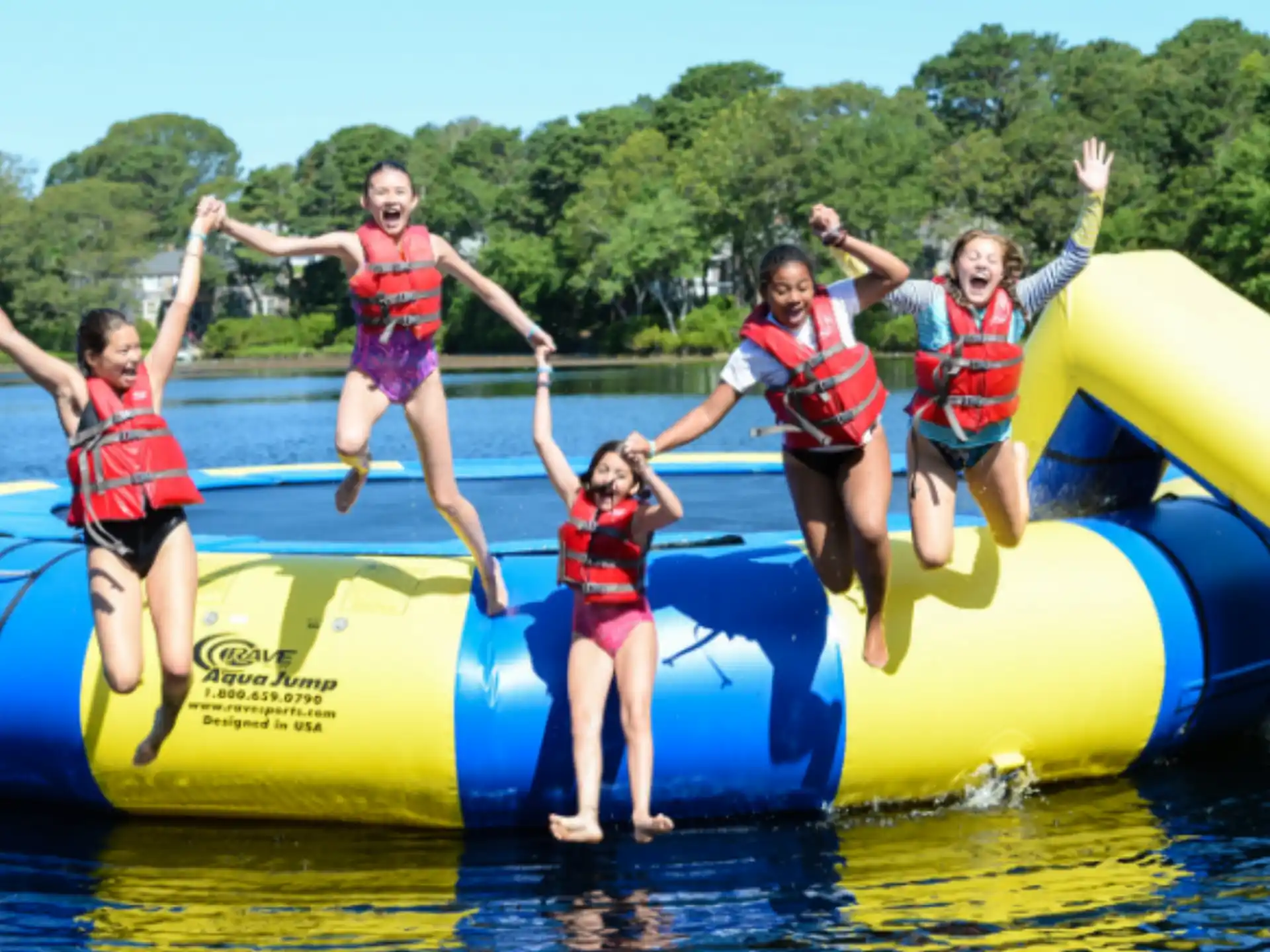 a group of children on a raft