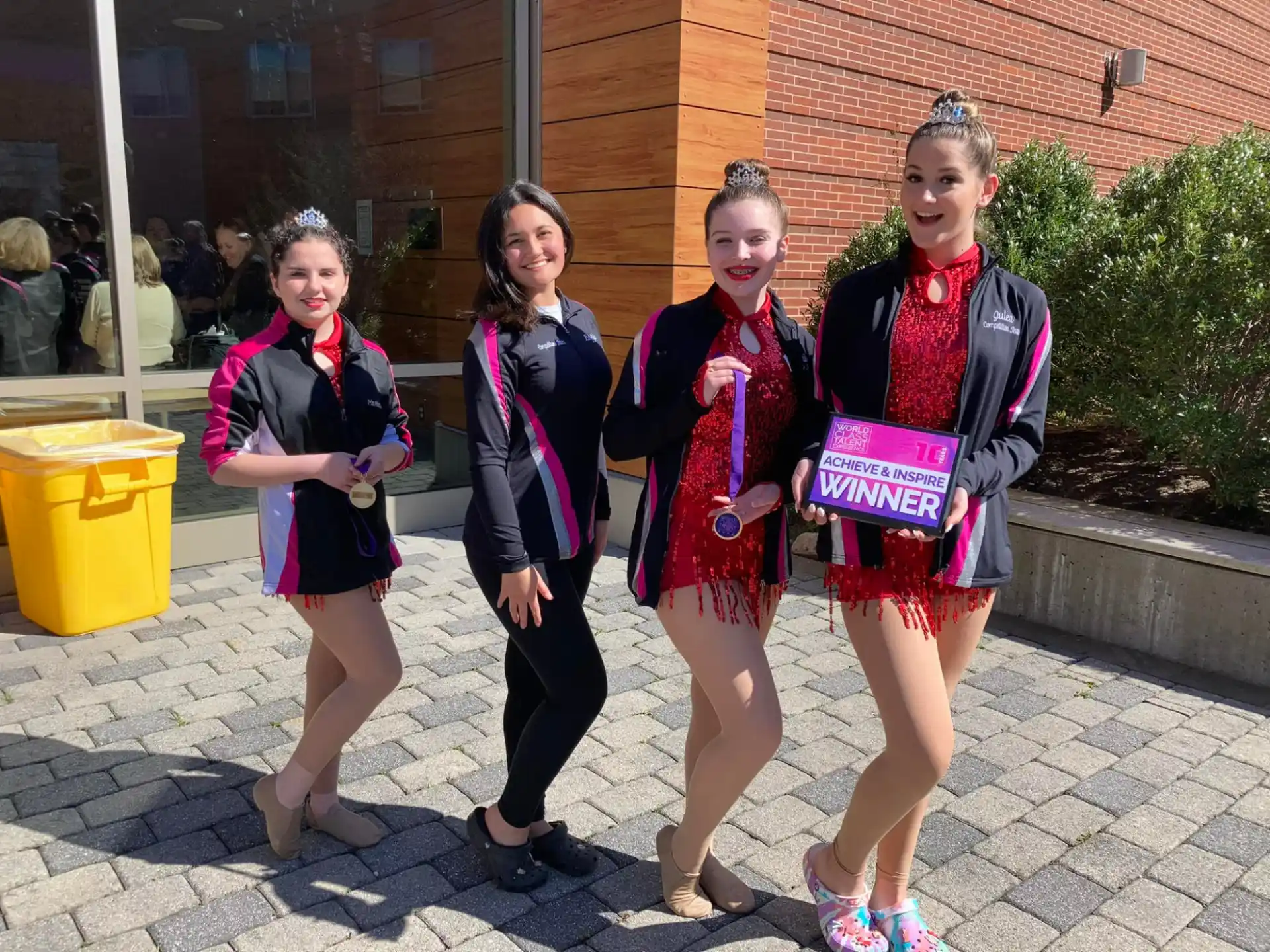 a group of girls posing for a photo