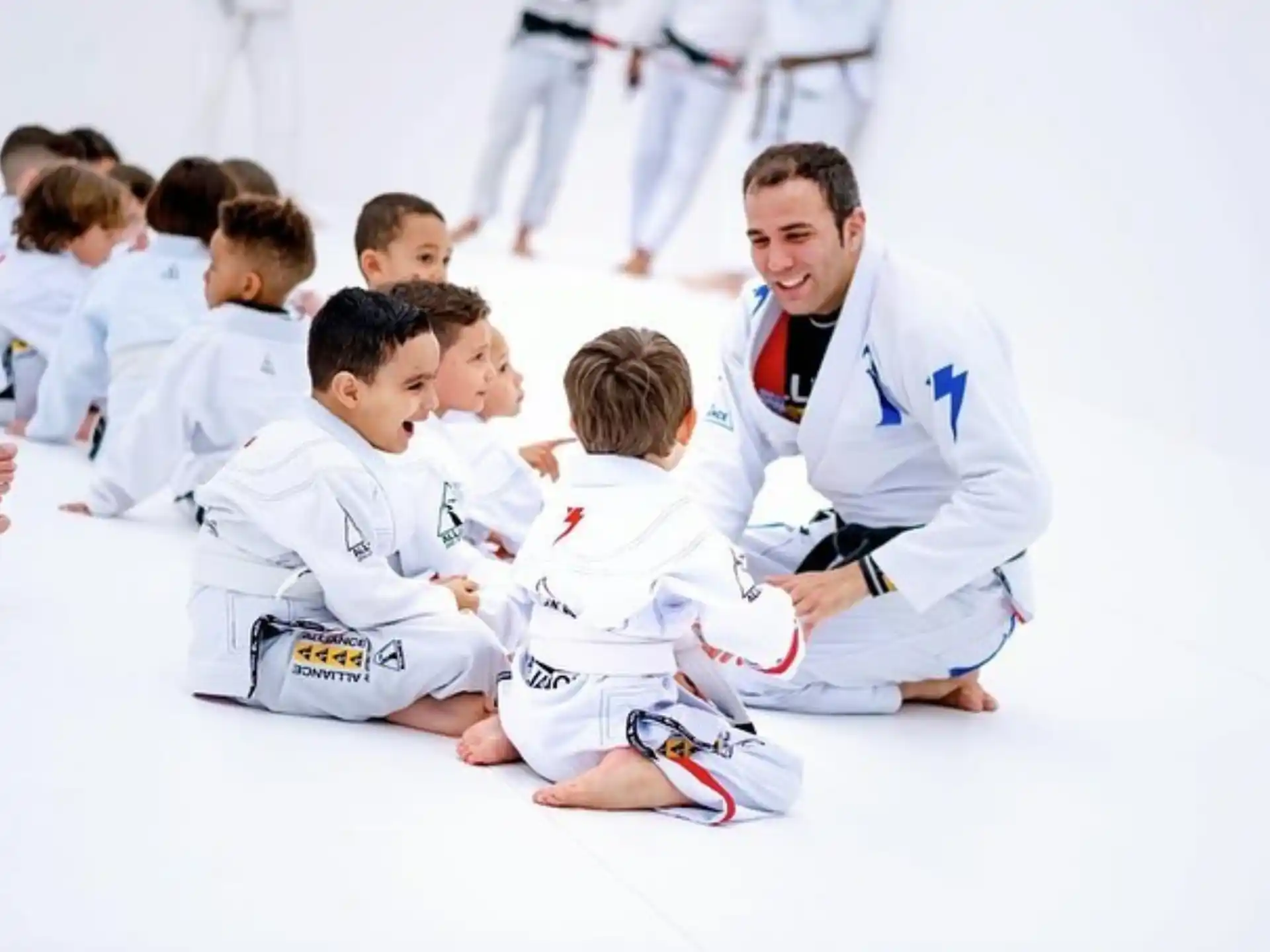 a group of people in karate uniforms