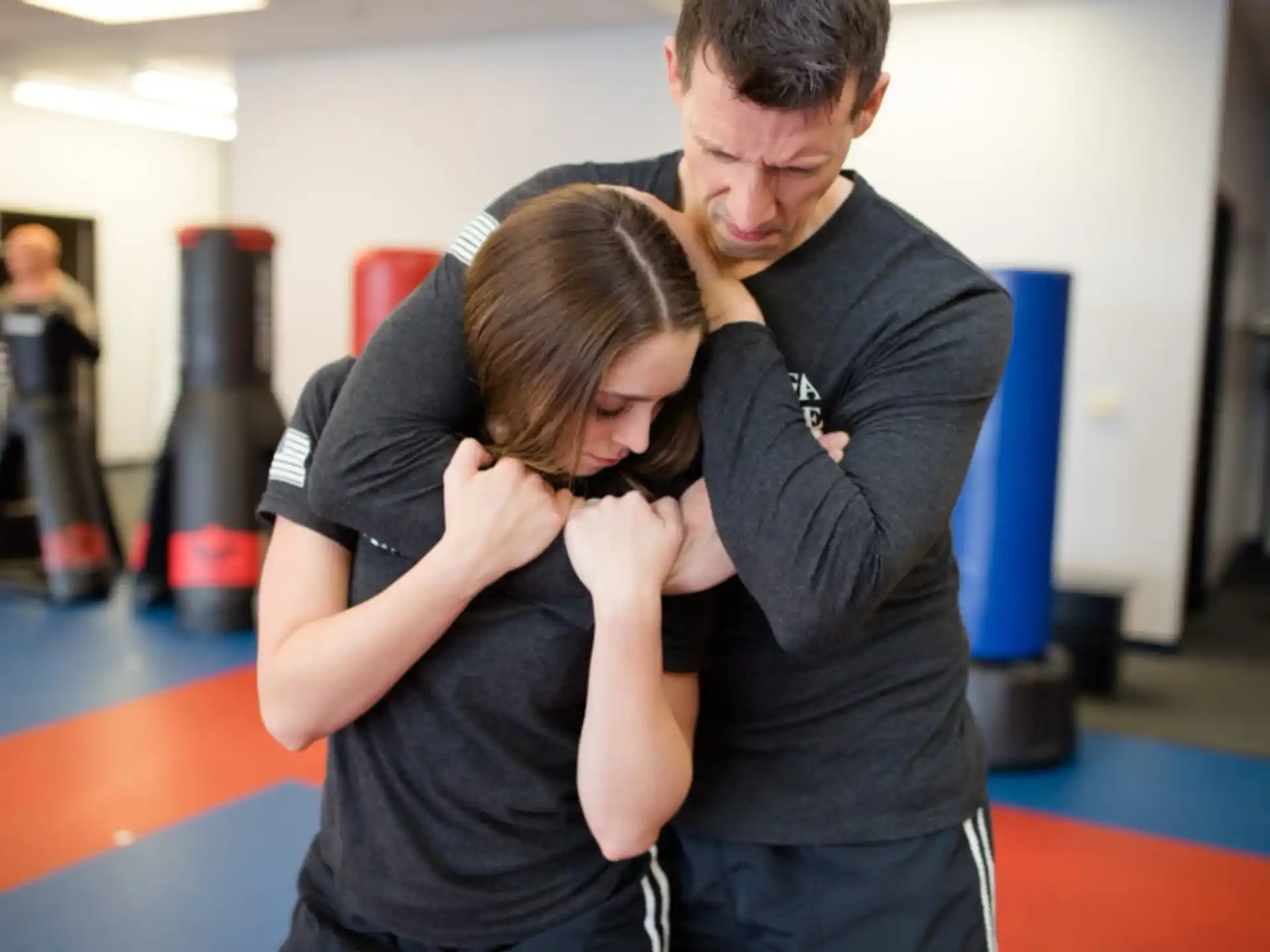 a man holding a woman
