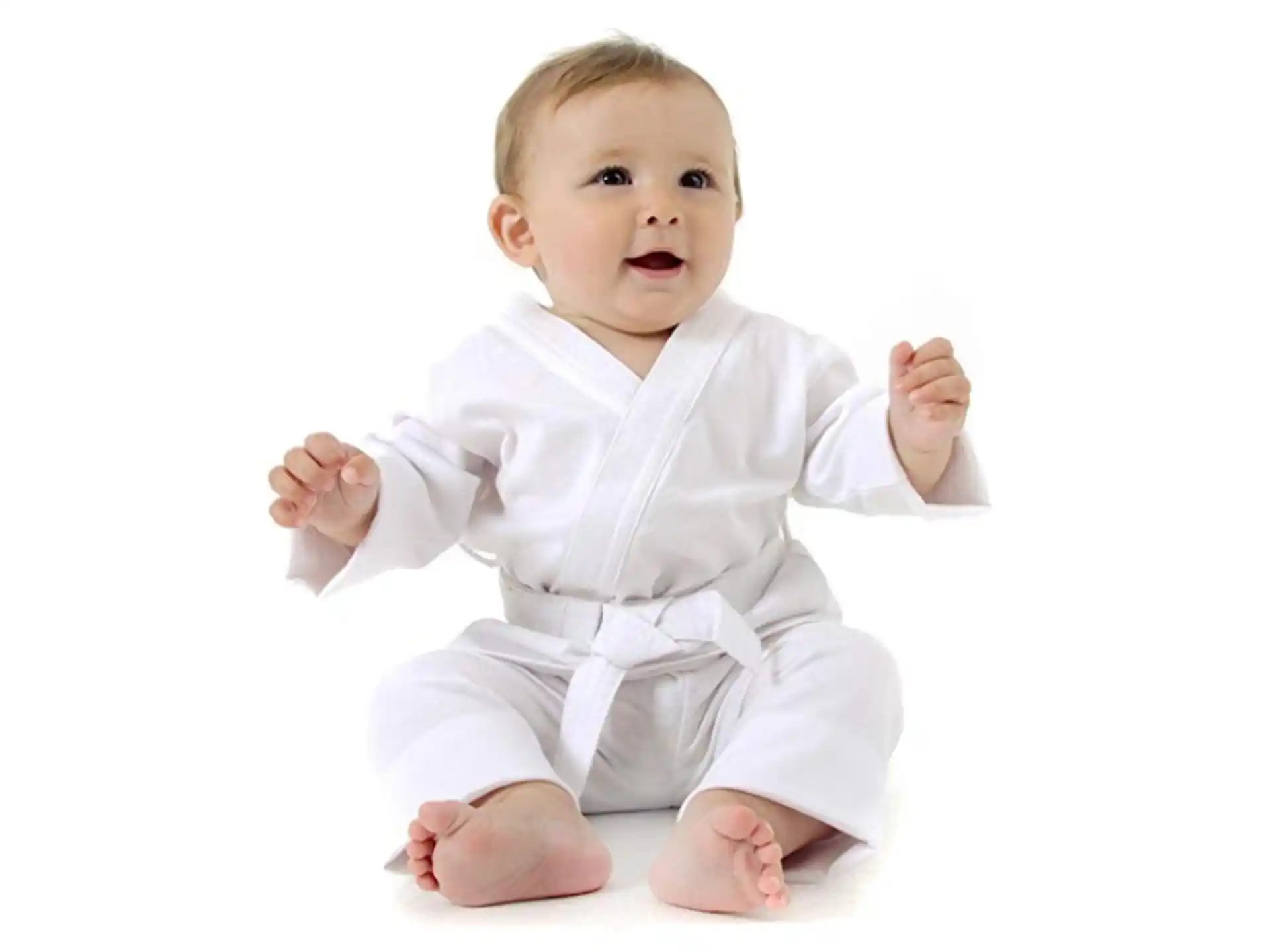 a baby sitting on a white background