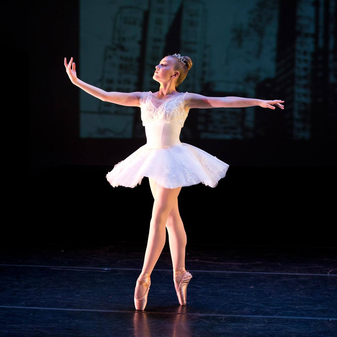 a woman dancing on a stage