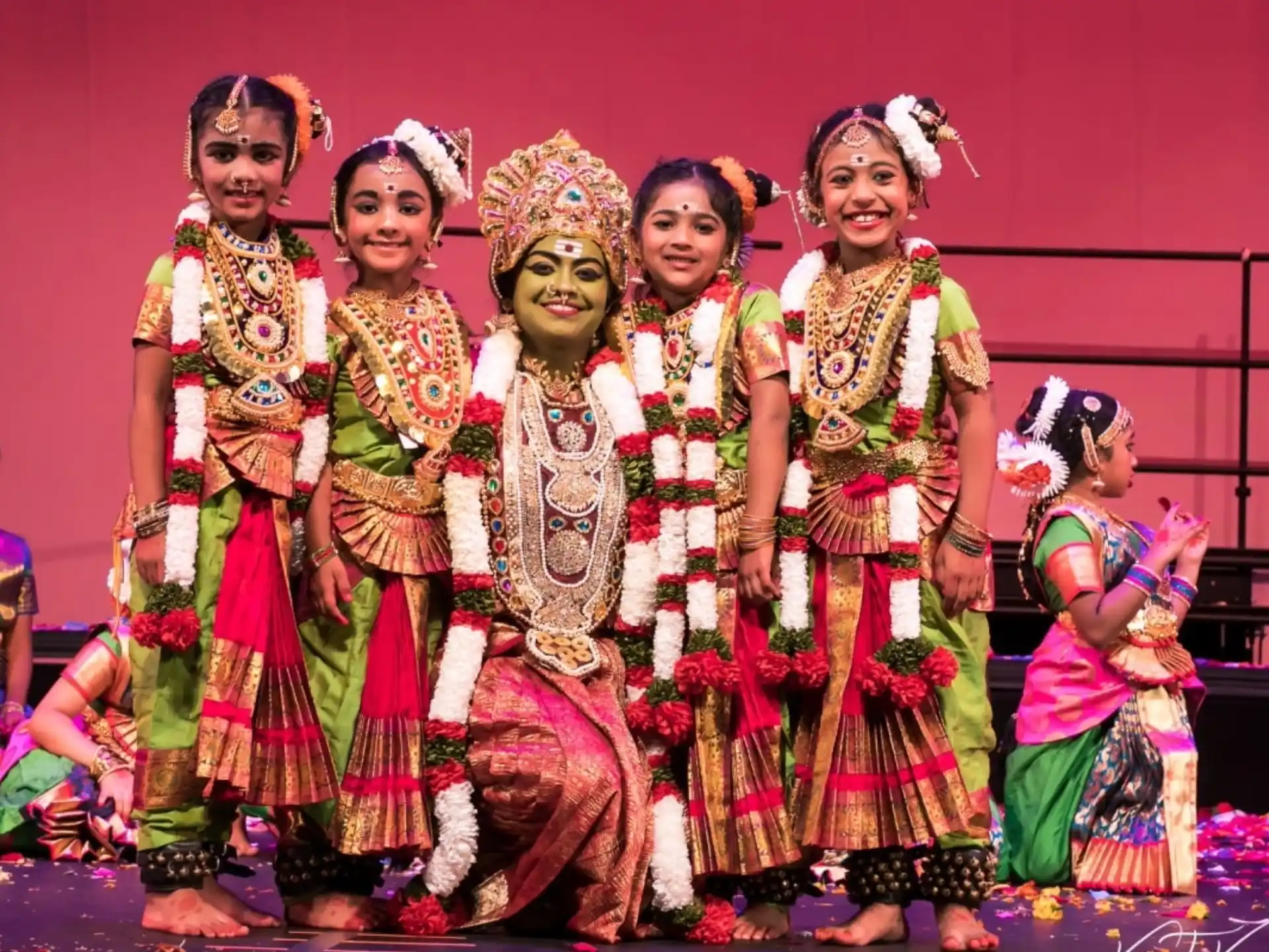 a group of women in traditional indian attire