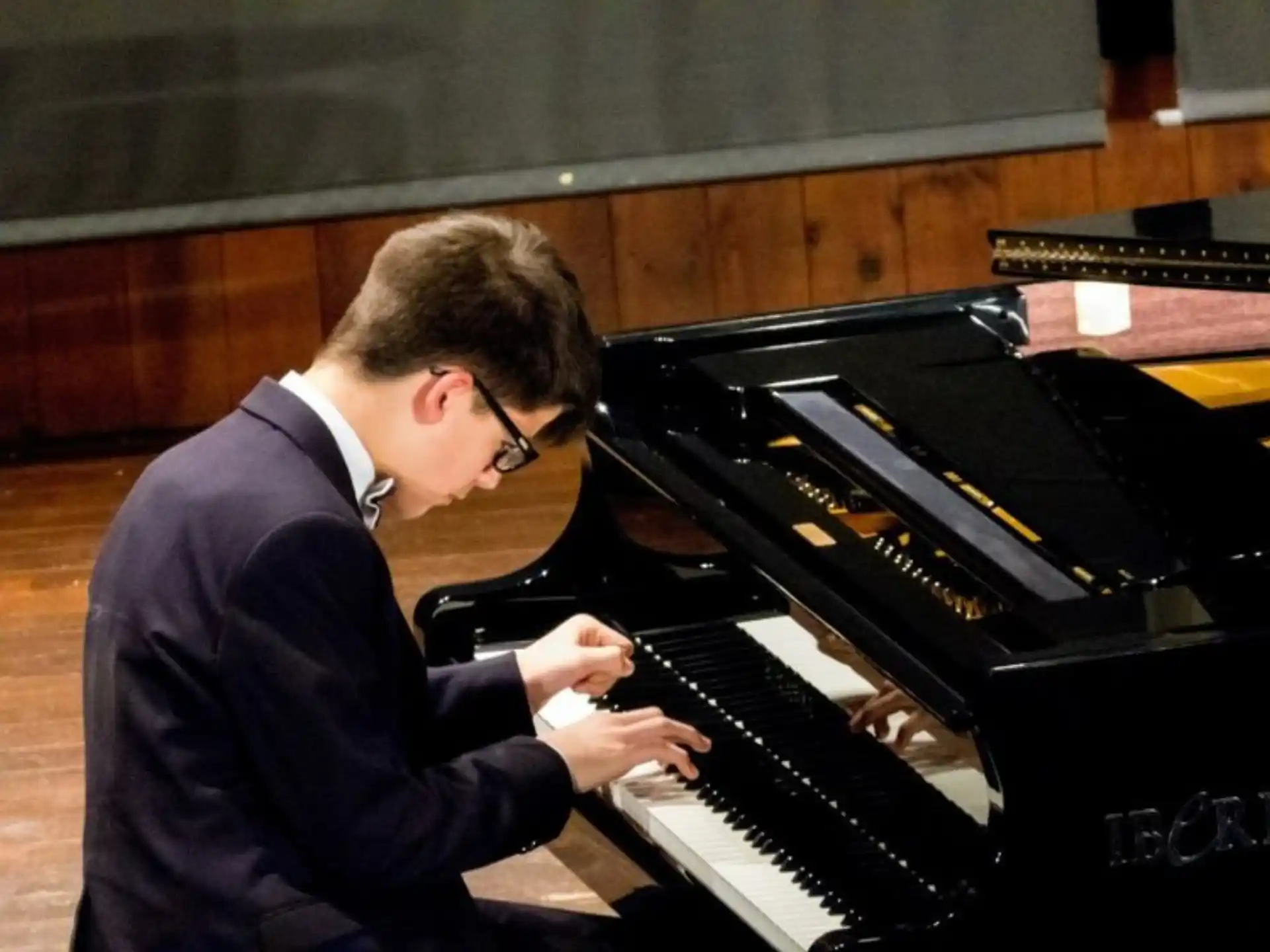 a man playing a piano