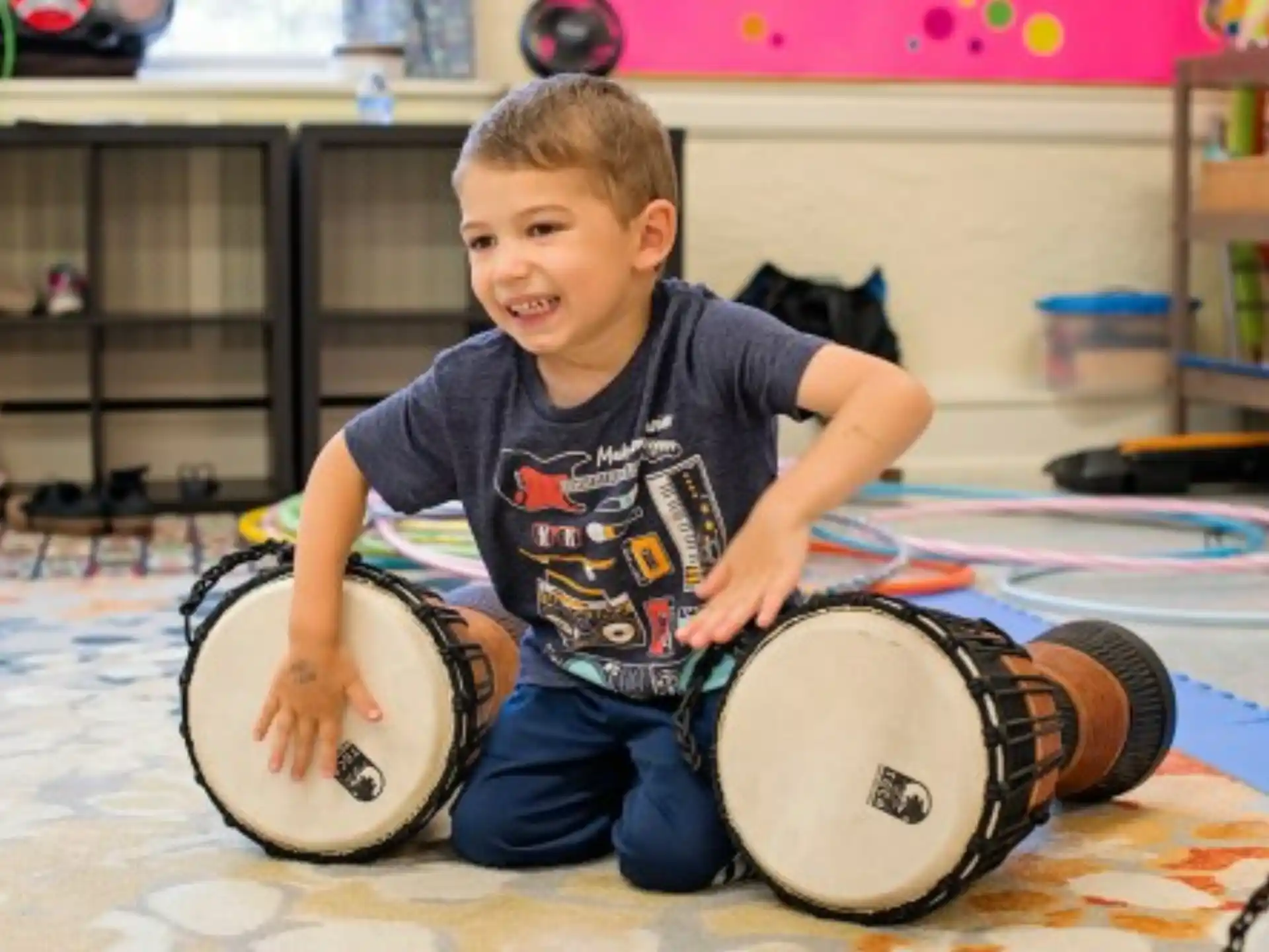 a boy playing drums