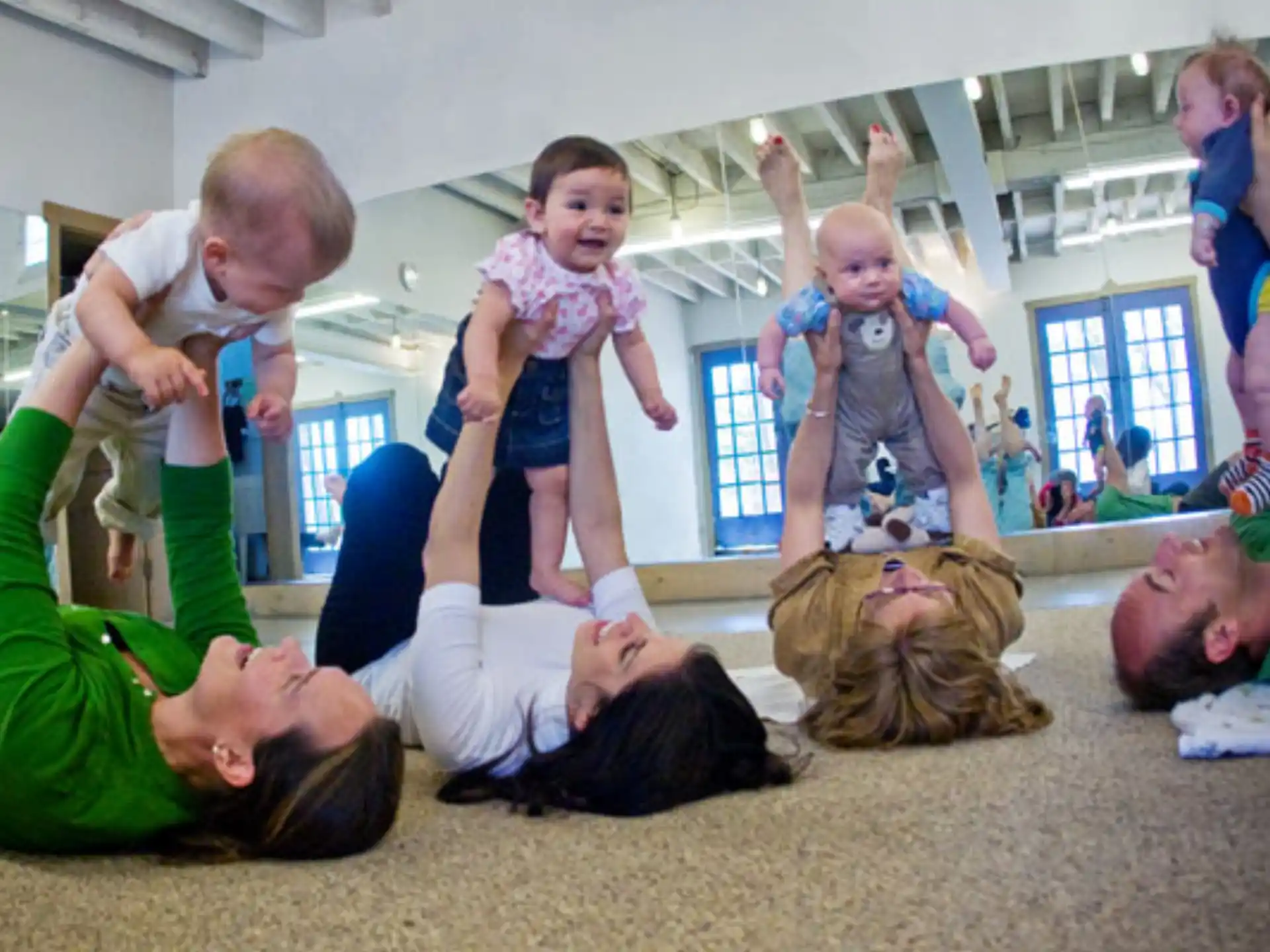 a group of people doing yoga