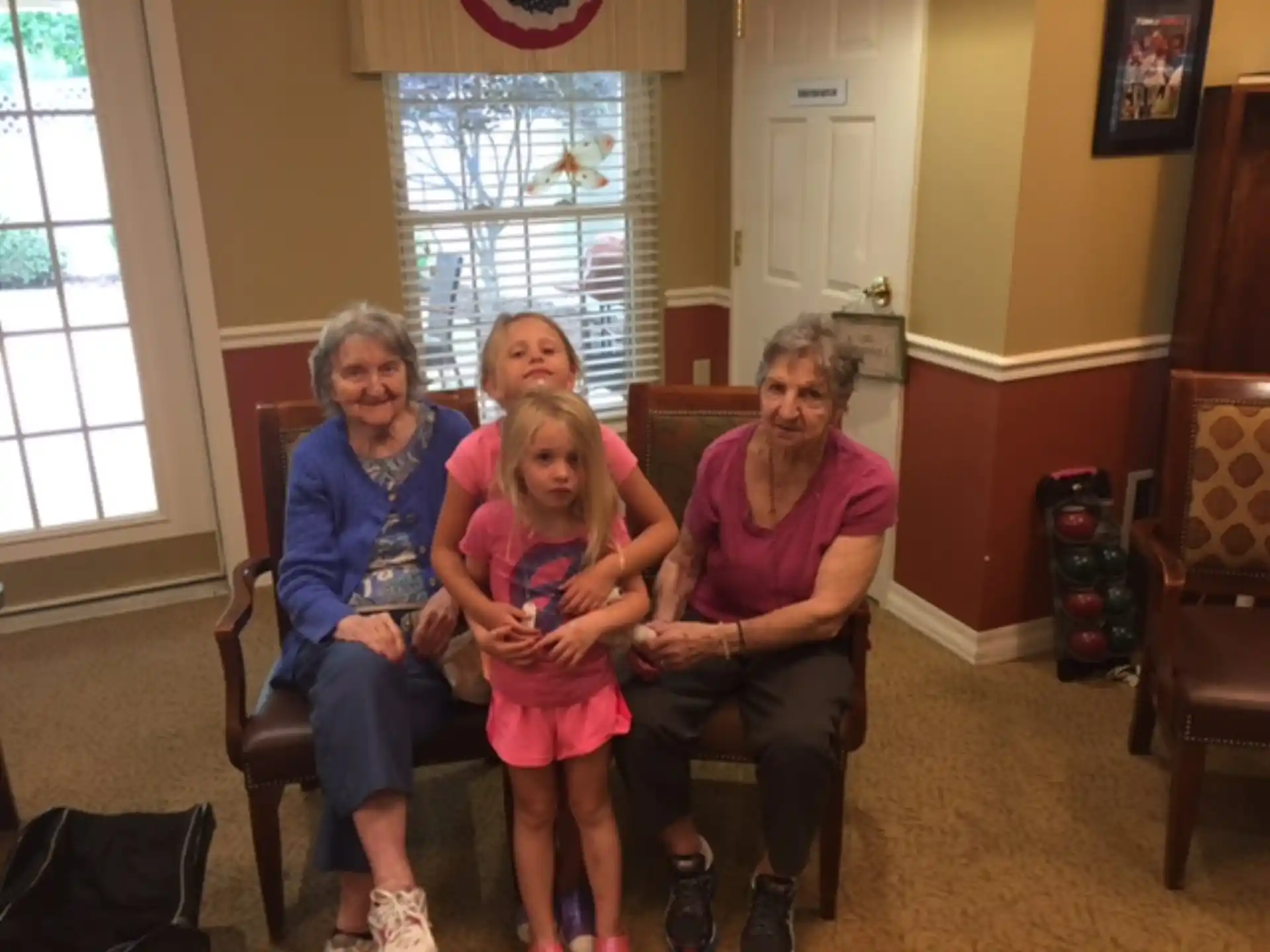 a group of people sitting in chairs