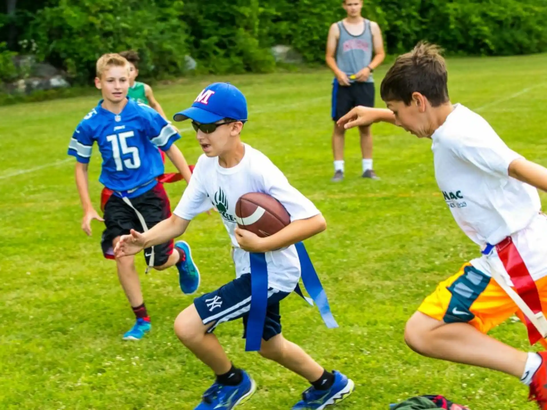 a group of boys playing football