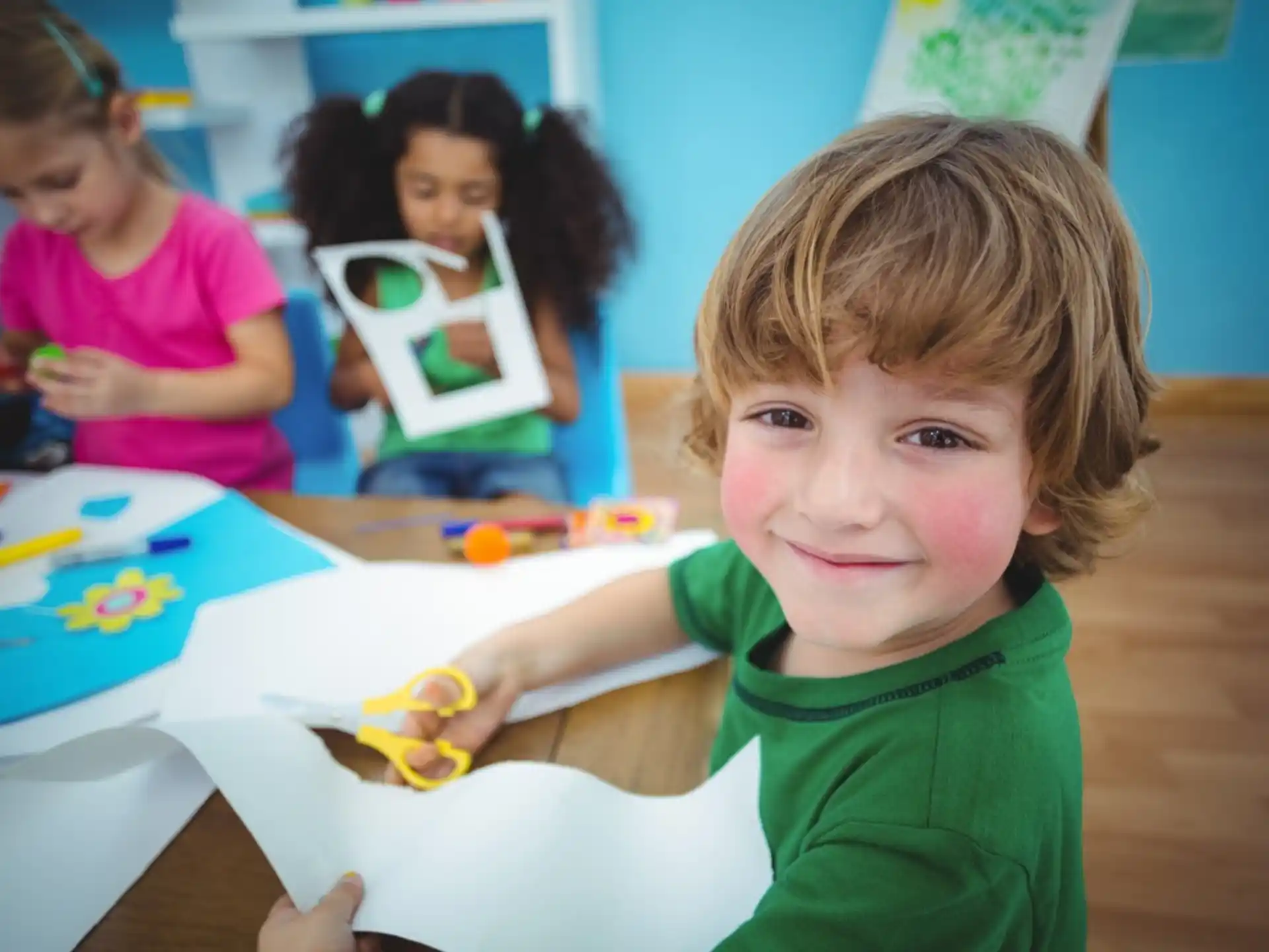 a young boy smiling