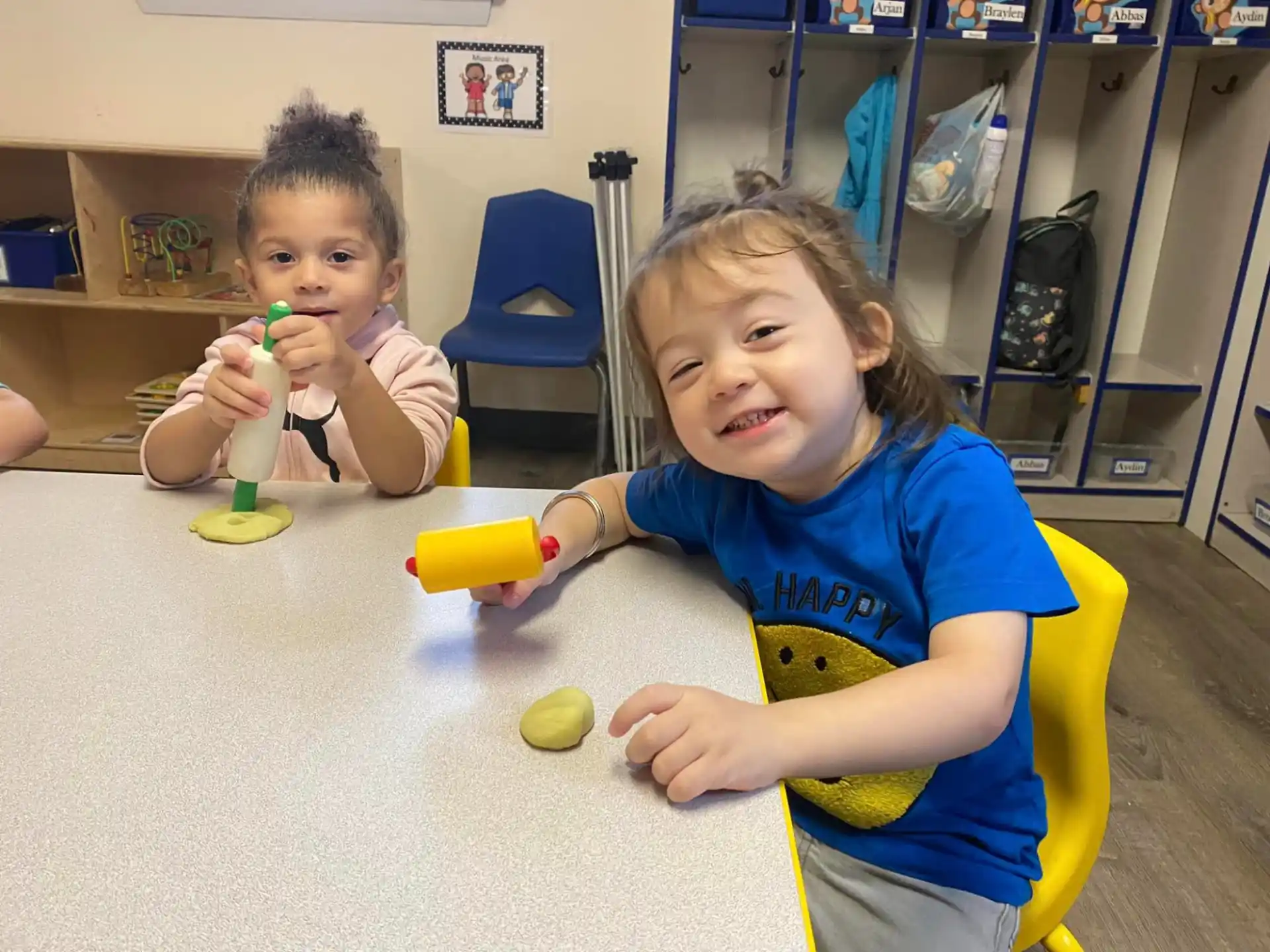 a couple of kids playing with toys