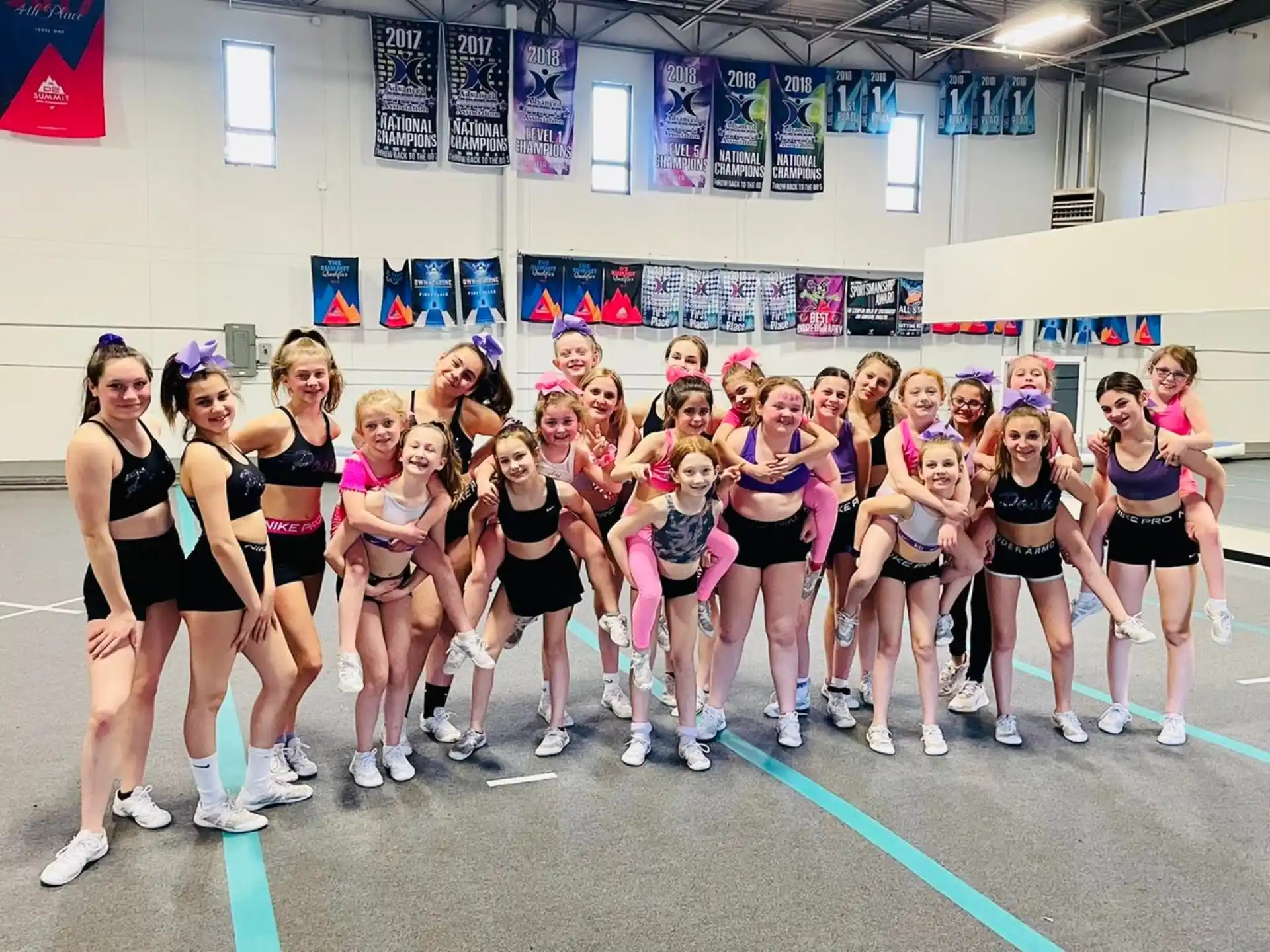 a group of women in a gym