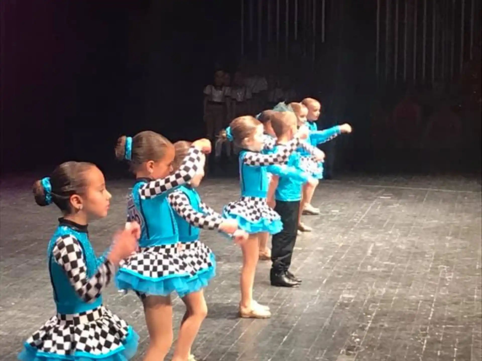 a group of children dancing