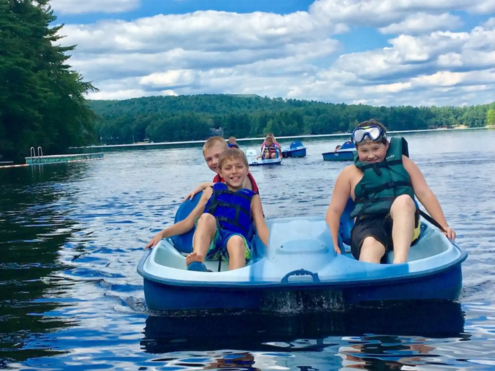 a group of people on a raft